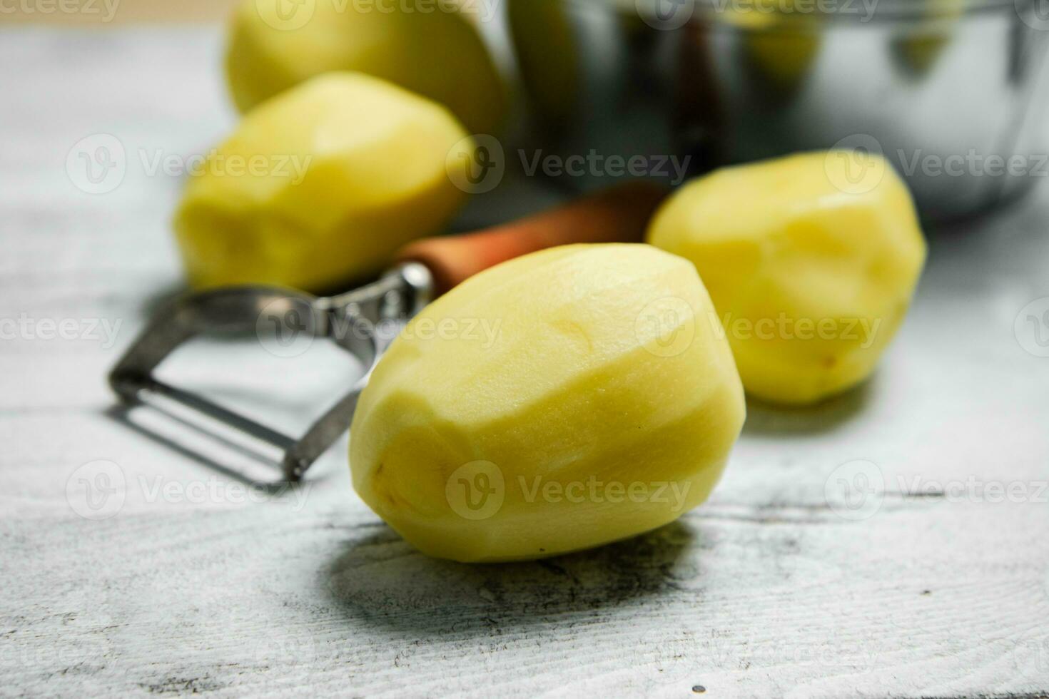 Fresh peeled potatoes. photo