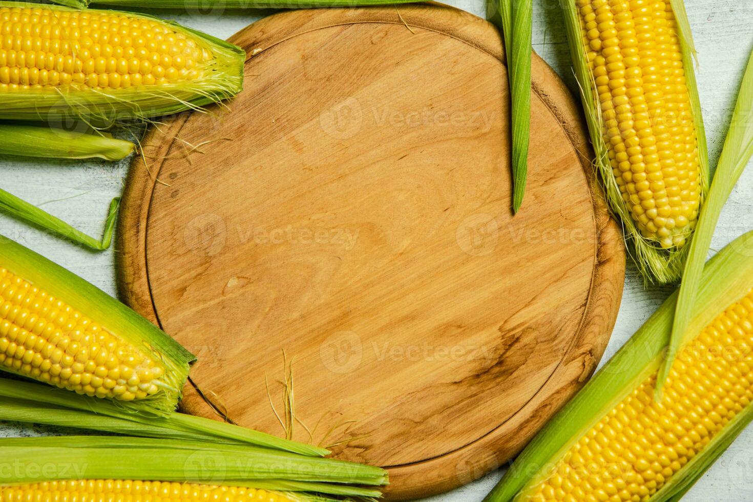 Fresh corn on light table. photo