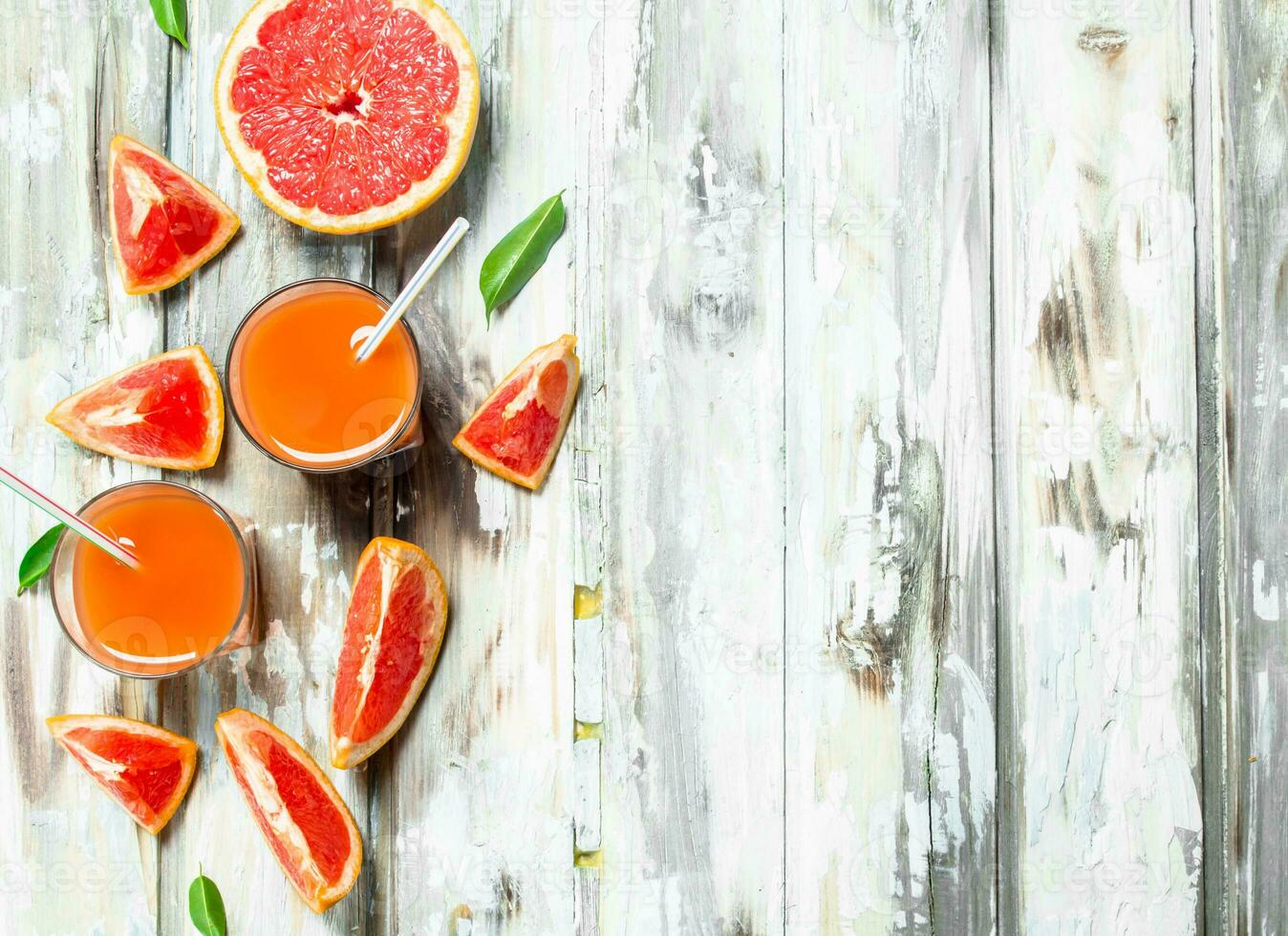 Juice and grapefruit slices. photo