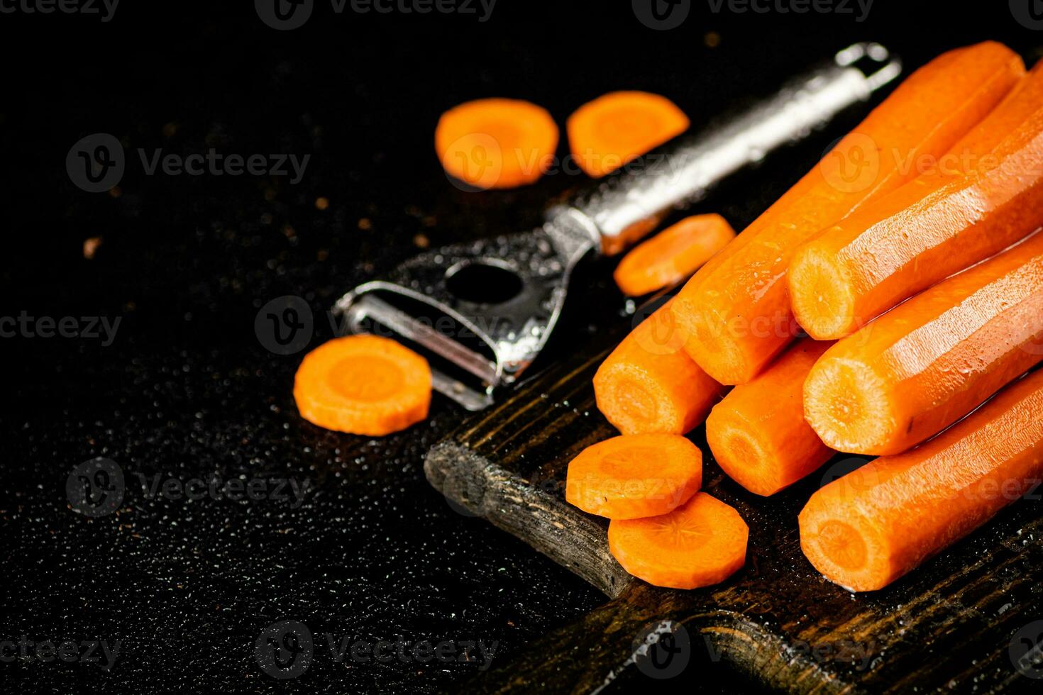 Fresh carrots on a cutting board. photo
