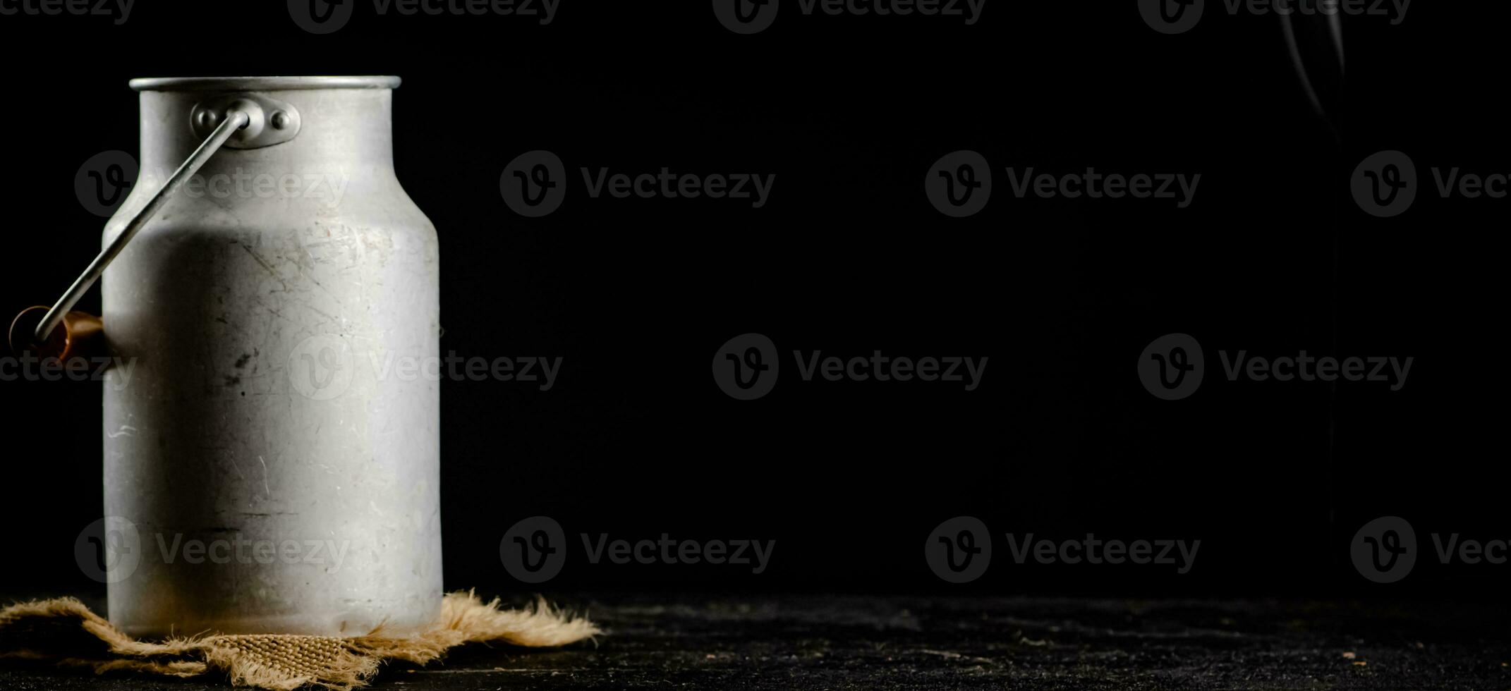 A can of milk on a napkin. photo