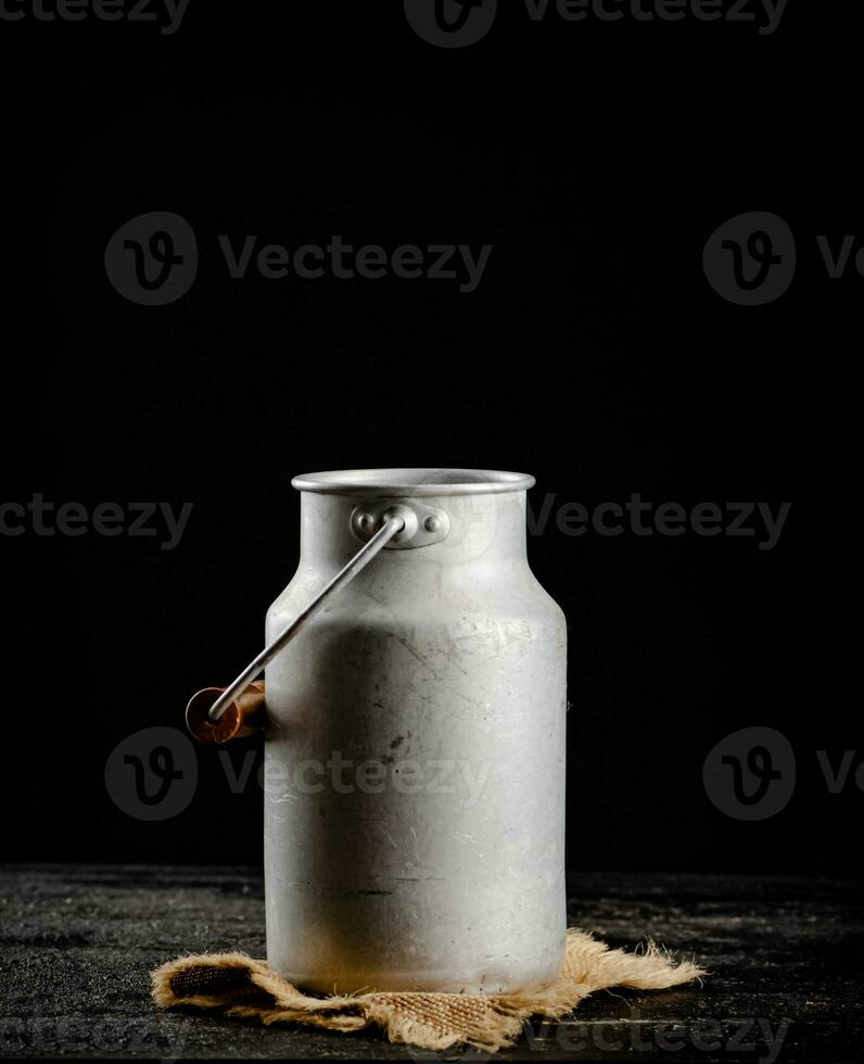 A can of milk on a napkin. photo