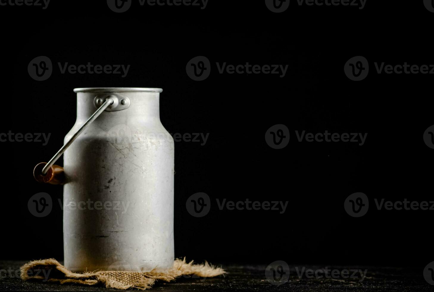 A can of milk on a napkin. photo