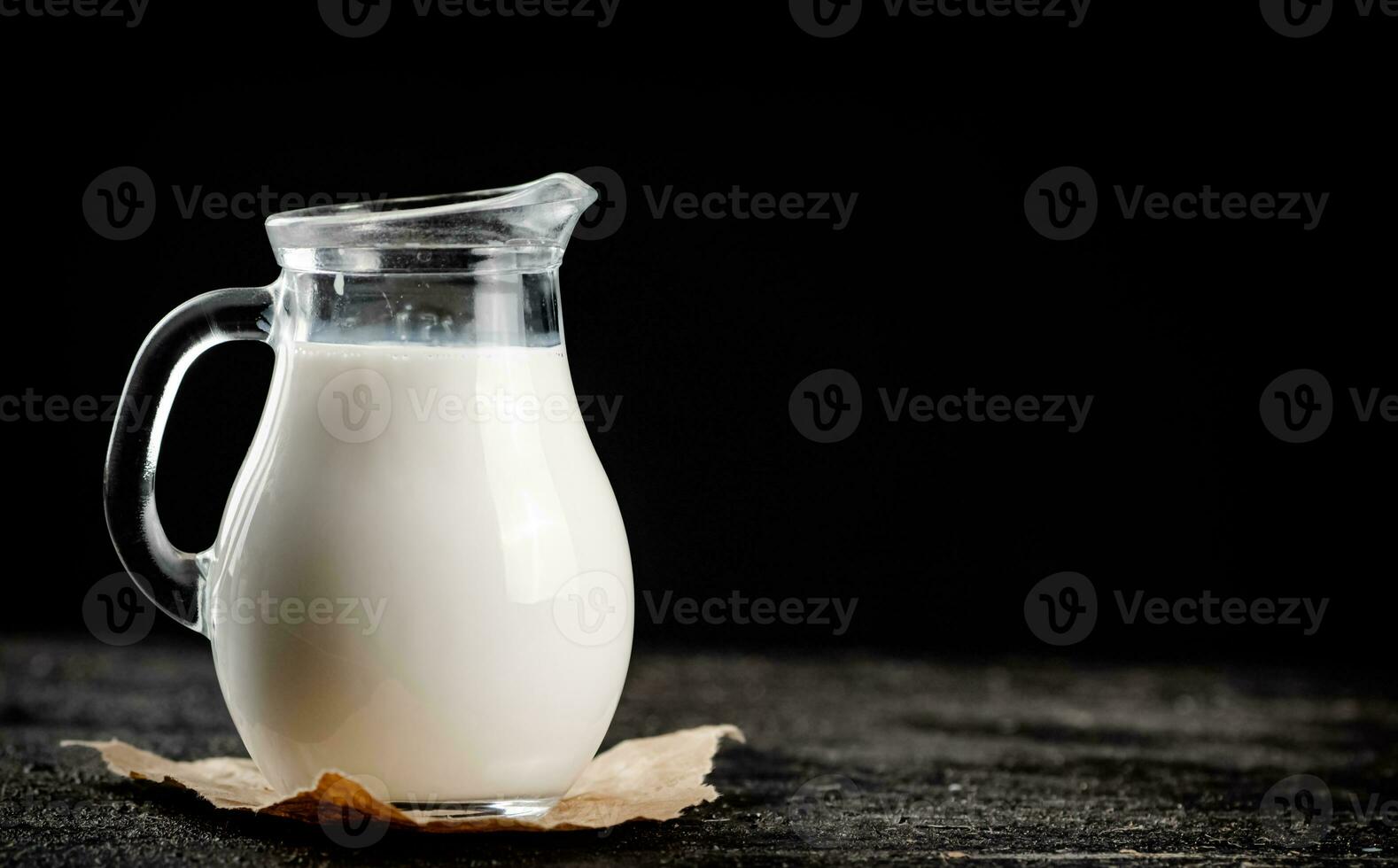 A full jug of fresh milk. photo