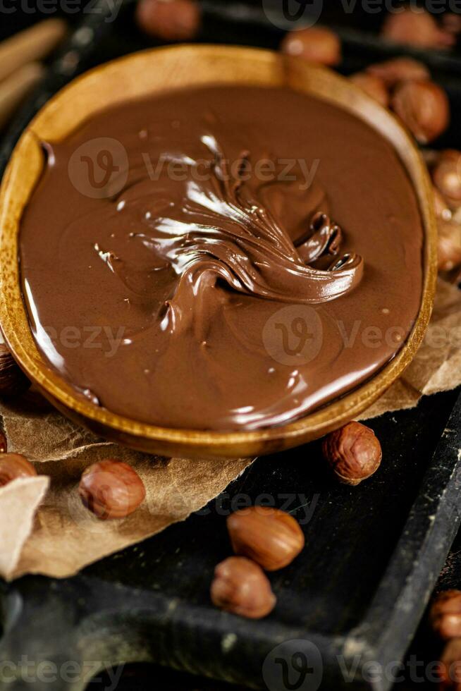 A plate of hazelnut butter on a cutting board. photo