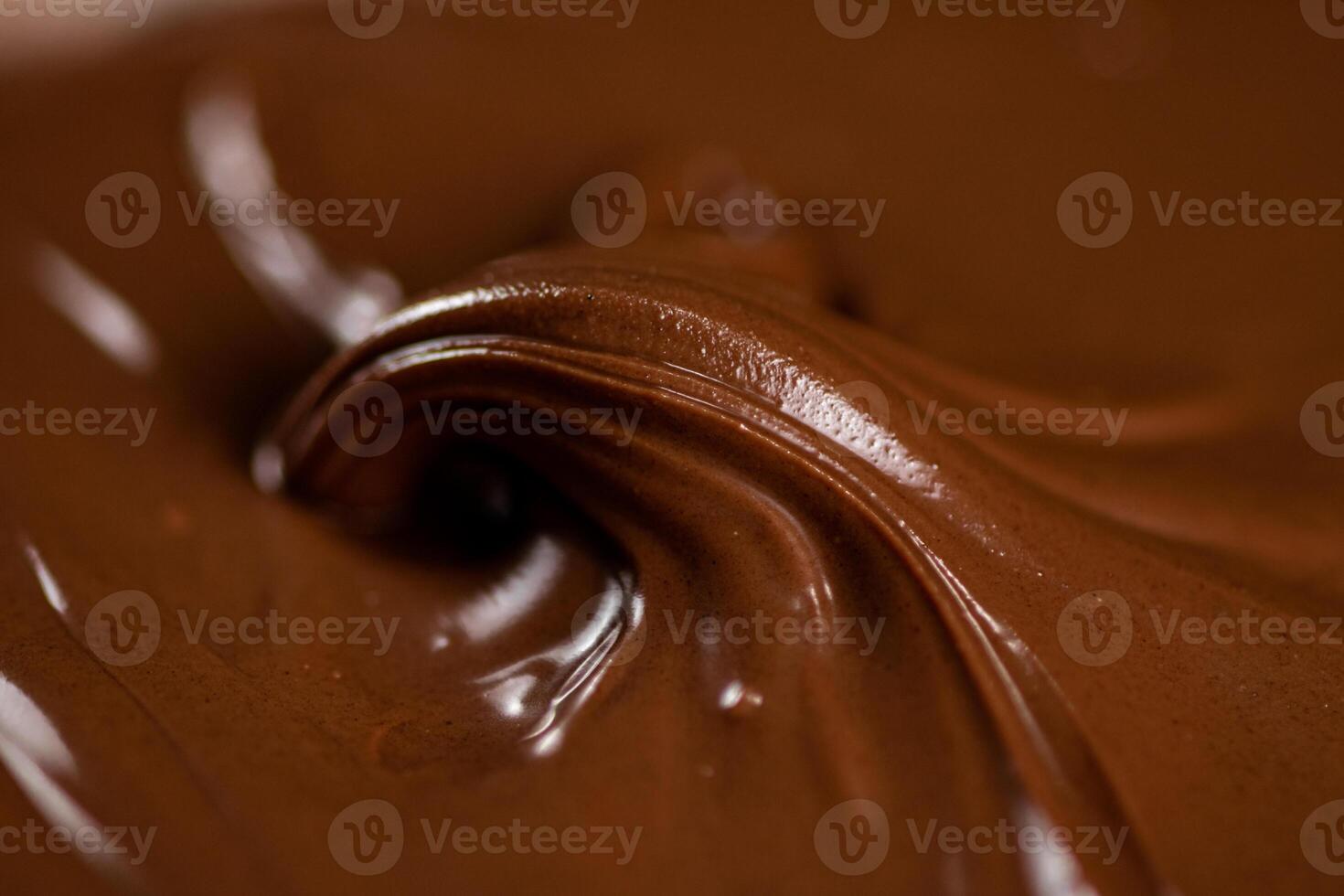 Hazelnut butter curl. Macro background. photo