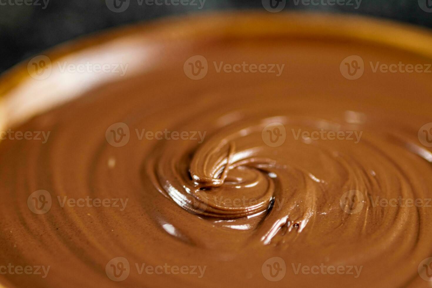 Fresh hazelnut butter. Macro background. photo