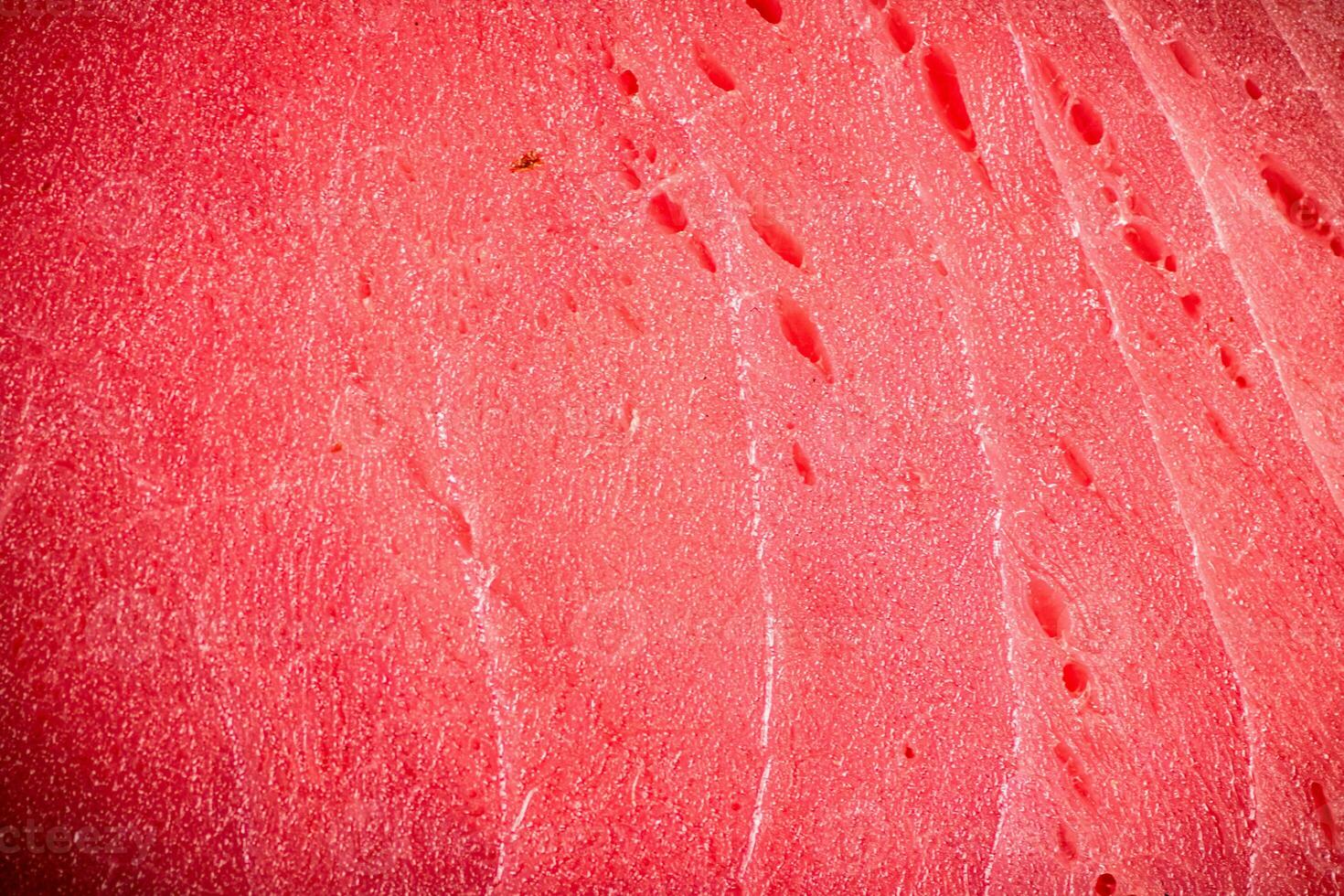 Raw tuna steak. Macro background. photo