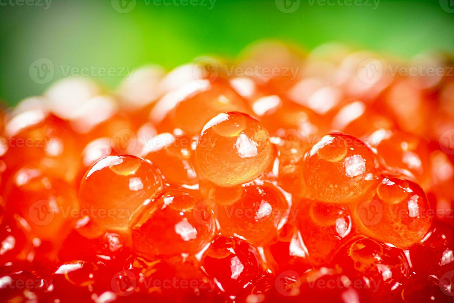 Grains of red caviar. Red caviar texture. photo