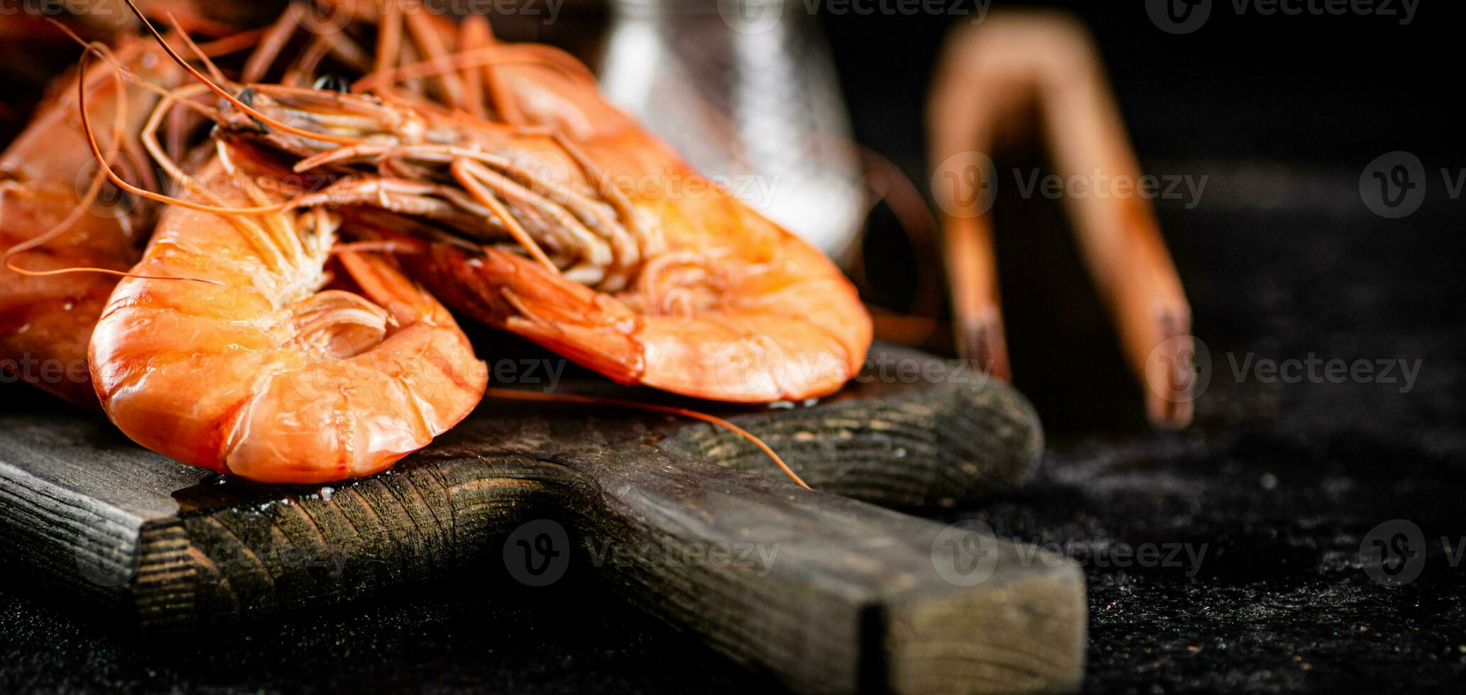 Boiled shrimp on a cutting board. photo