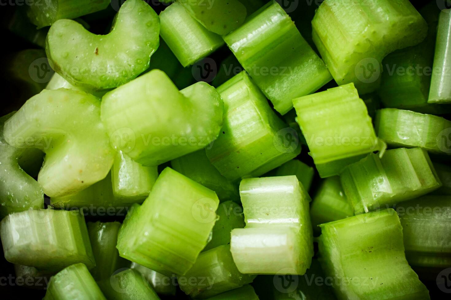 Slices of juicy celery. Macro background. photo
