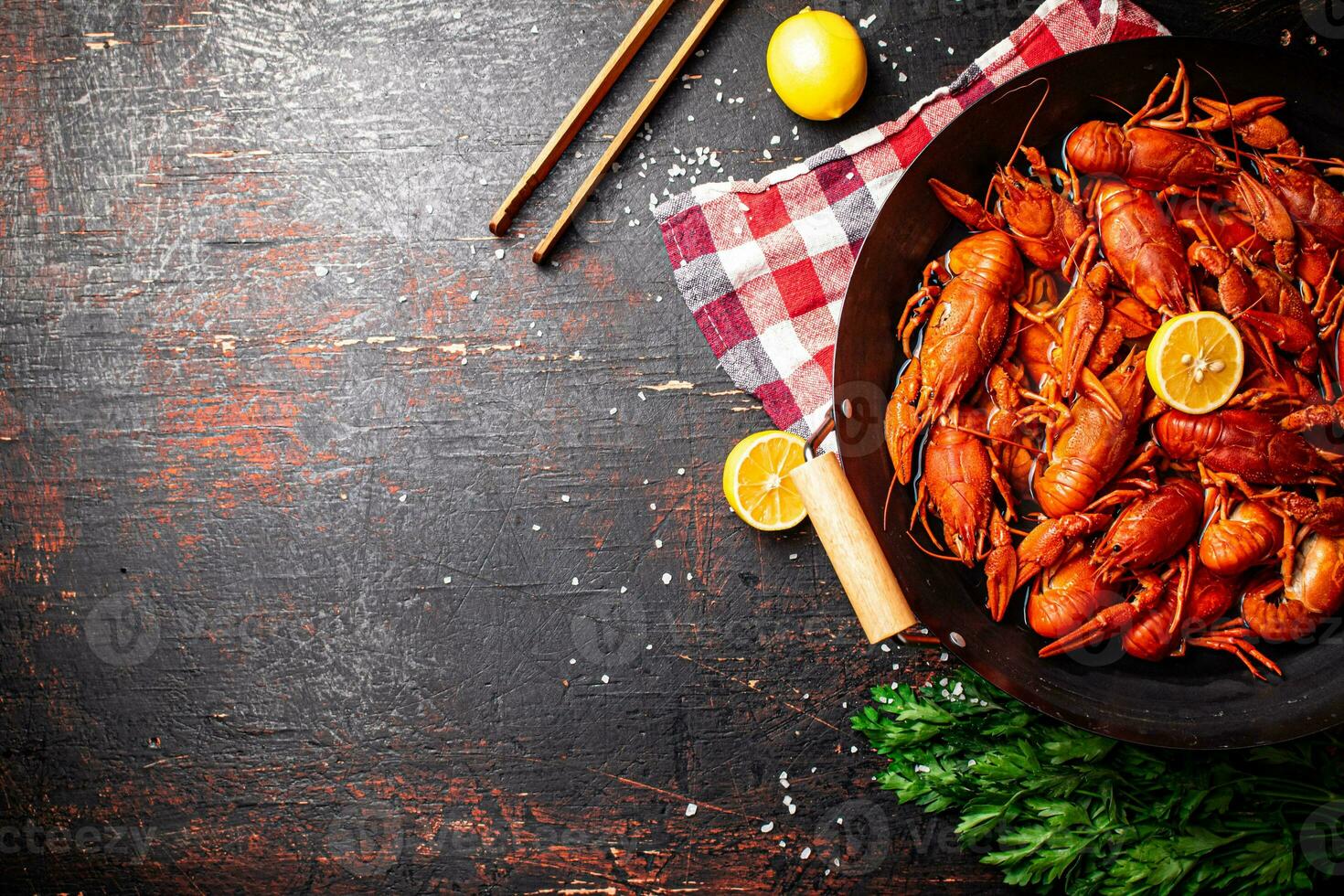 A pot of boiled crayfish on a napkin. photo