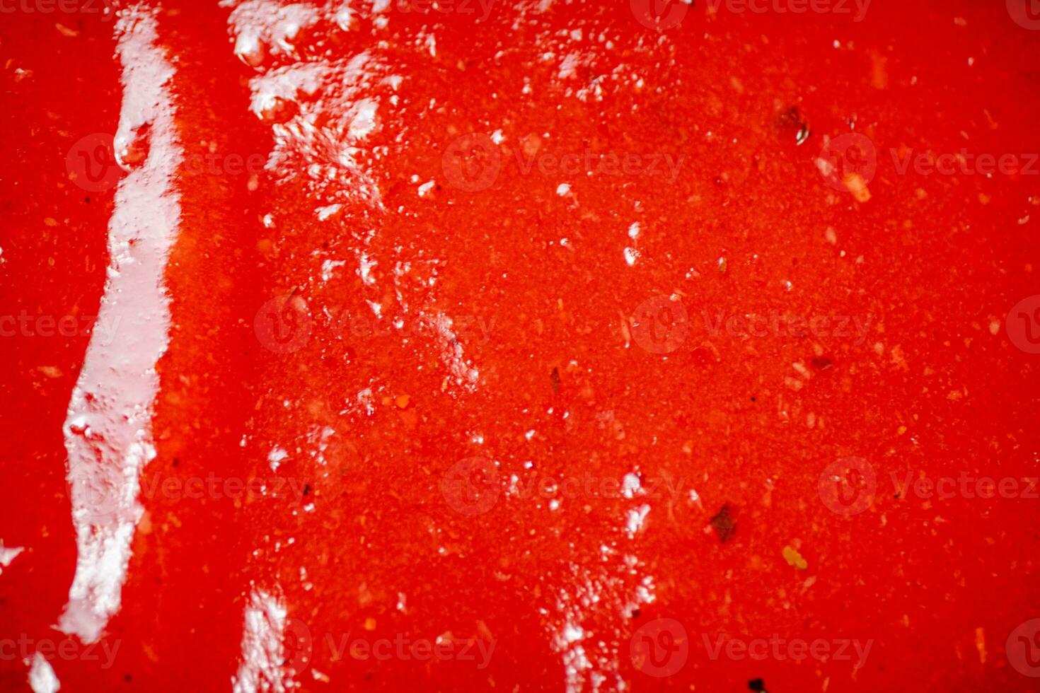 Sauce of ripe tomatoes. Macro background. photo