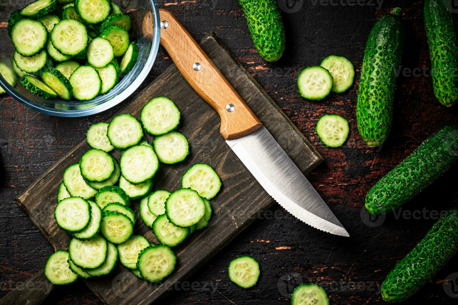 Cucumbers cut on a cutting board. photo