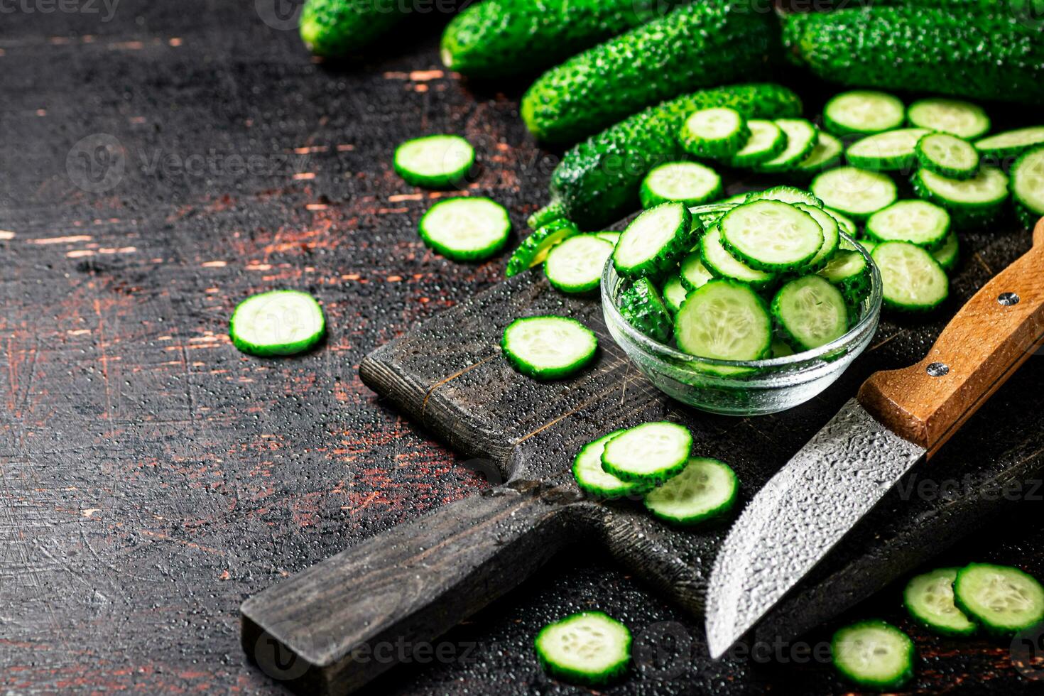 Cucumbers cut on a cutting board. photo