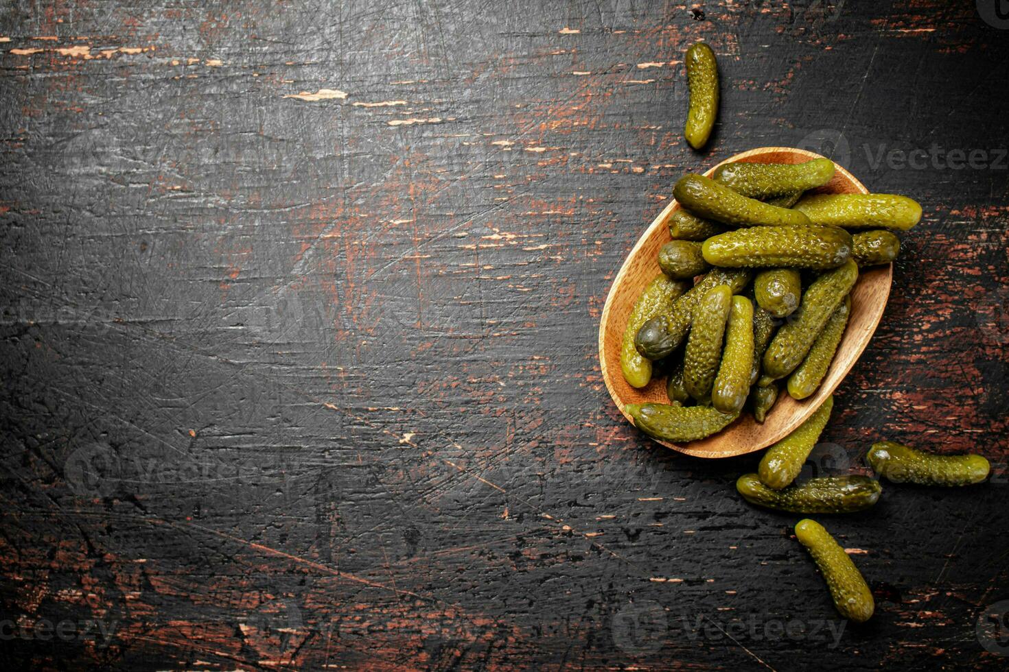 Homemade pickled cucumber on the table. photo