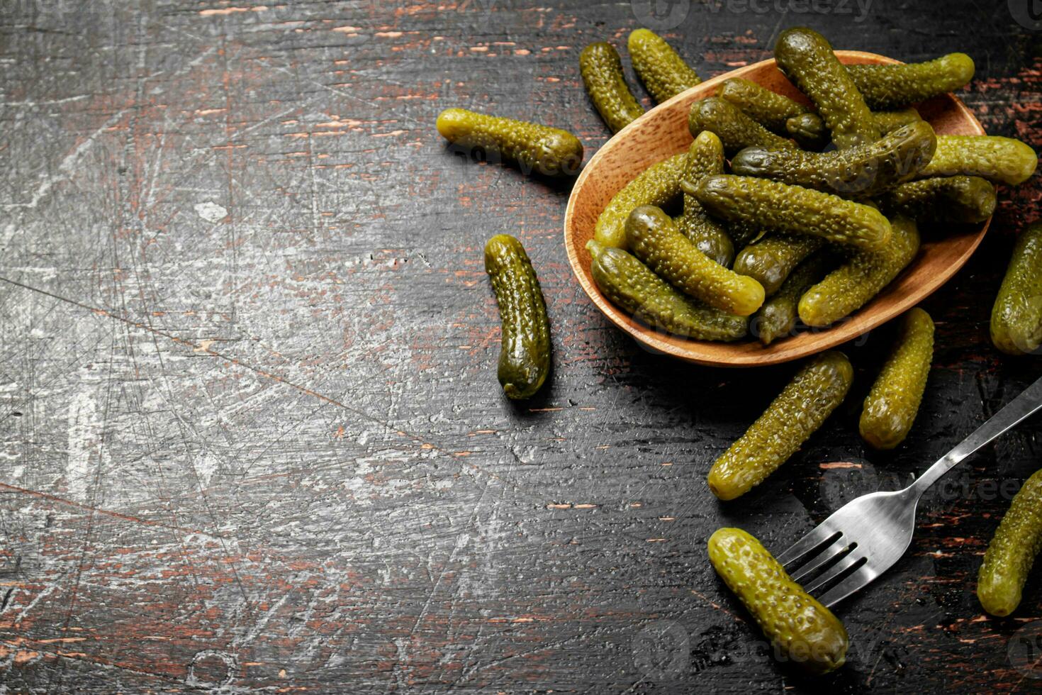 Homemade pickled cucumber on the table. photo
