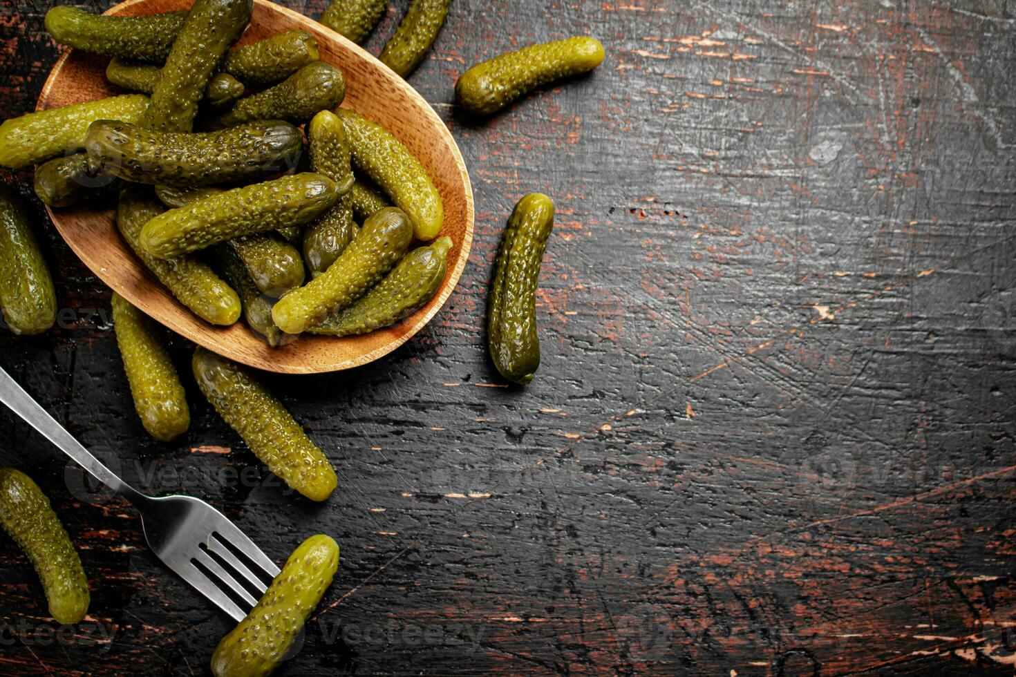 Homemade pickled cucumber on the table. photo