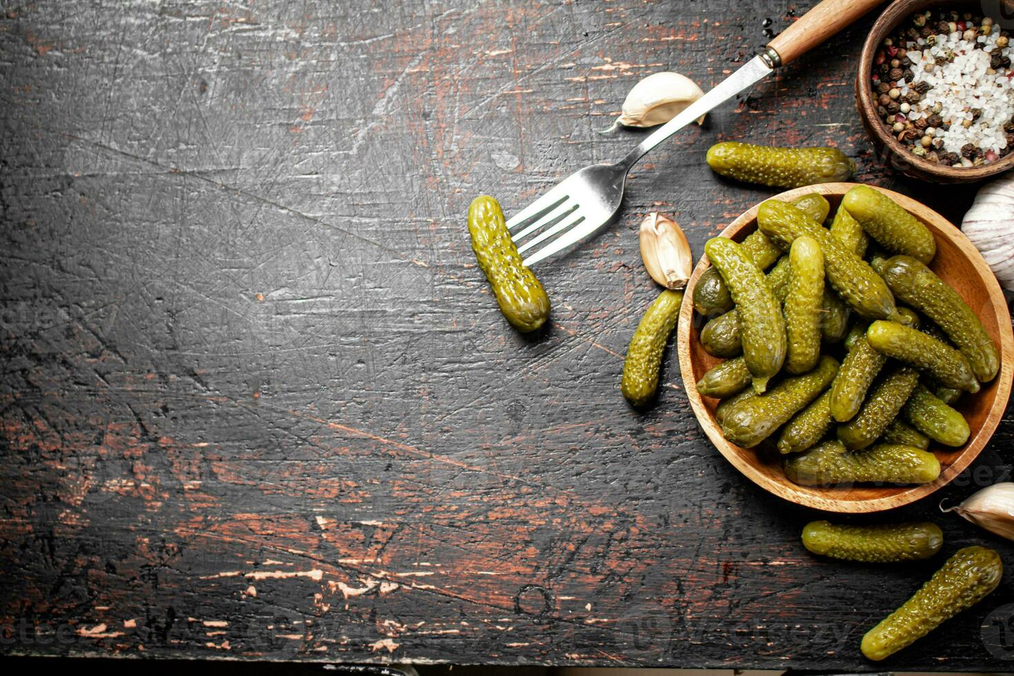 Homemade pickled cucumber on the table. photo