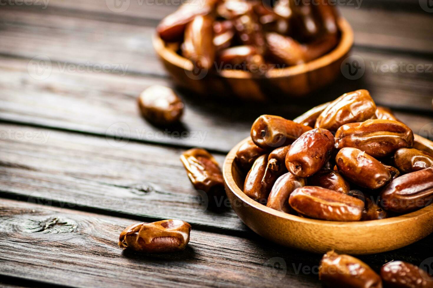 Fresh dates in two plates. photo