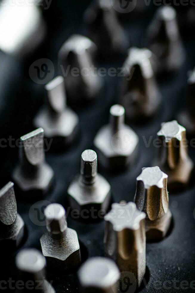 Set of construction bits. Macro background. photo