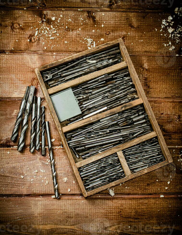 Various drill bits for drills. photo