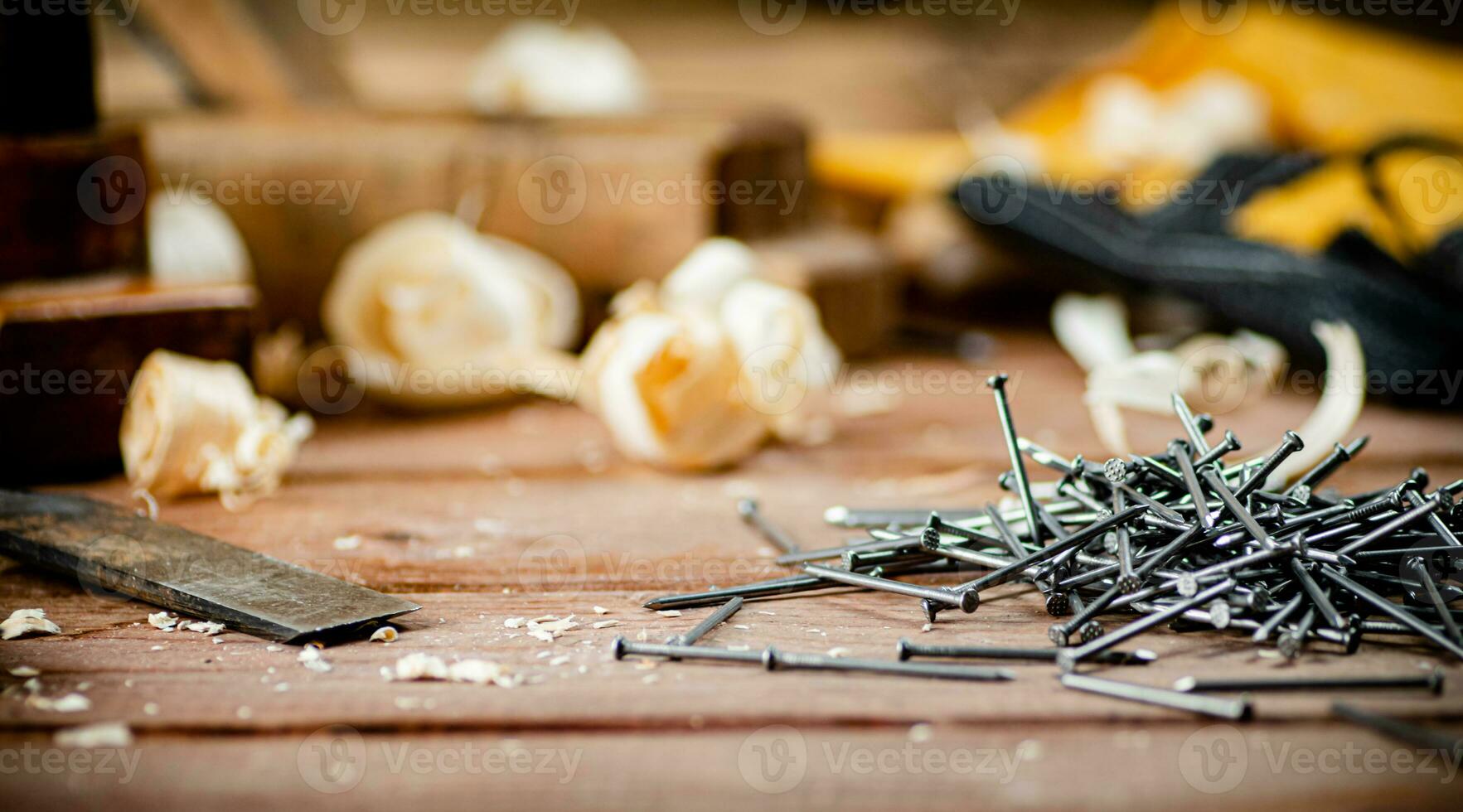 A pile of nails on the table. photo