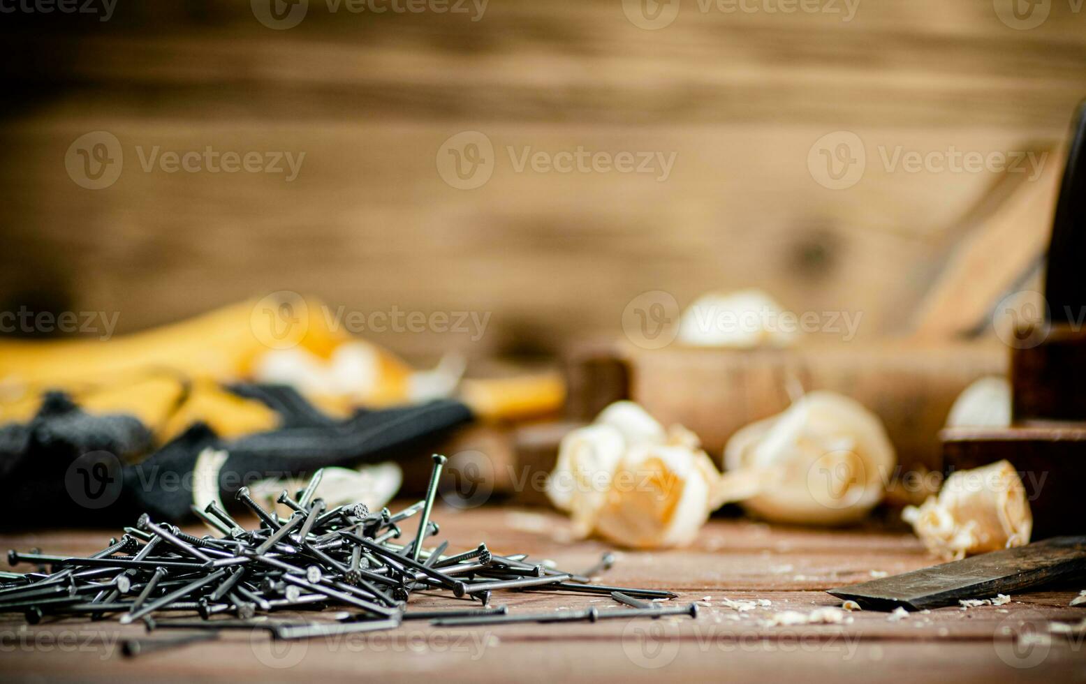 A pile of nails on the table. photo