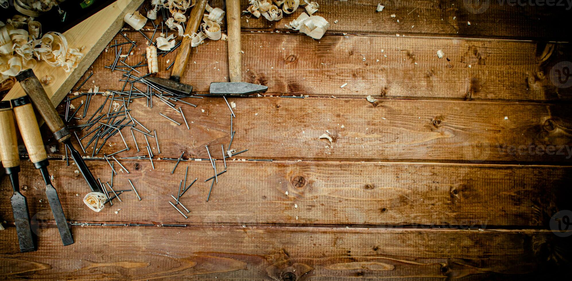 Working tool. Chisel, hammer and nails. photo