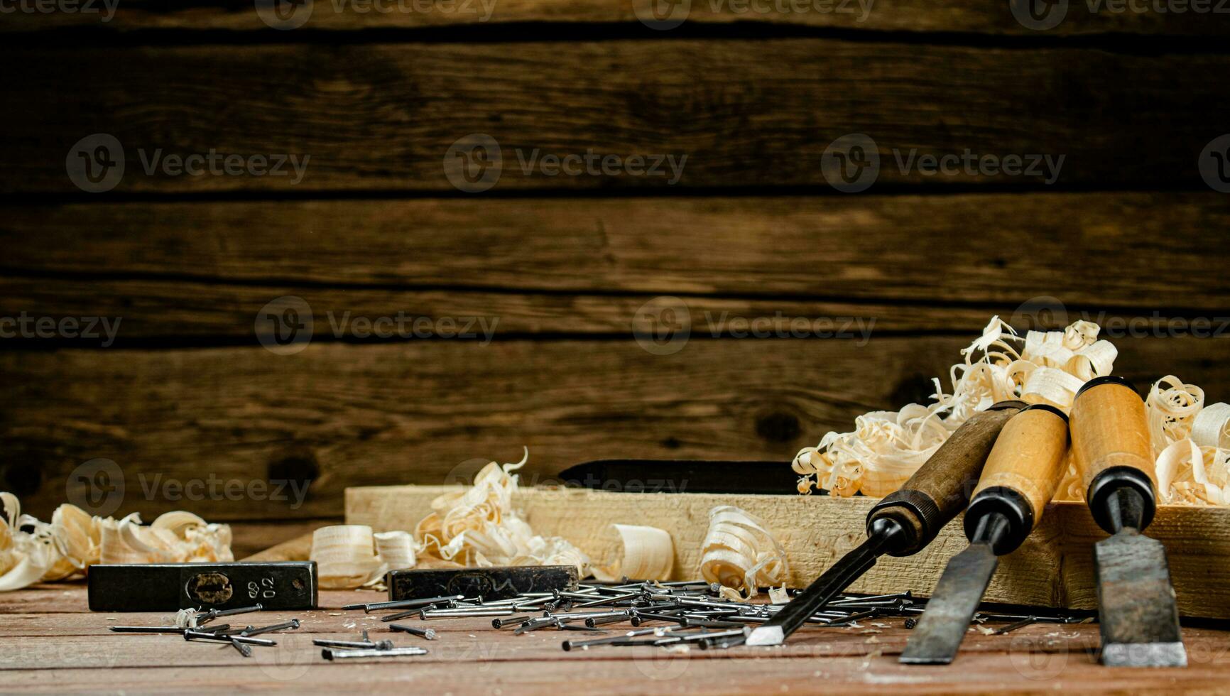 Working tool. Chisel, hammer and nails. photo