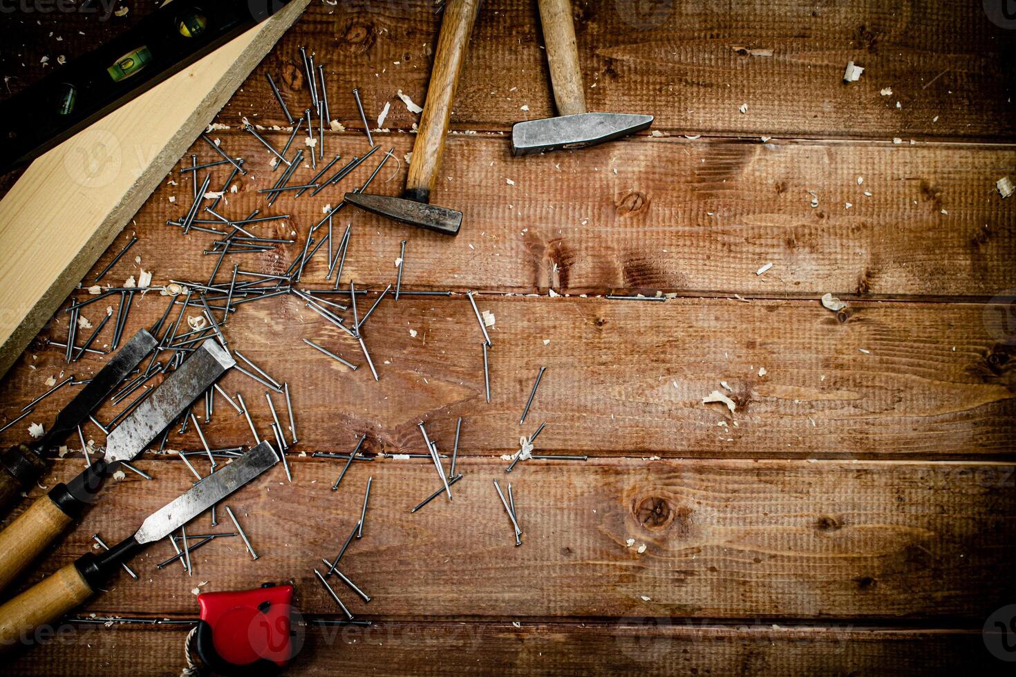 Working tool. Chisel, hammer and nails. photo