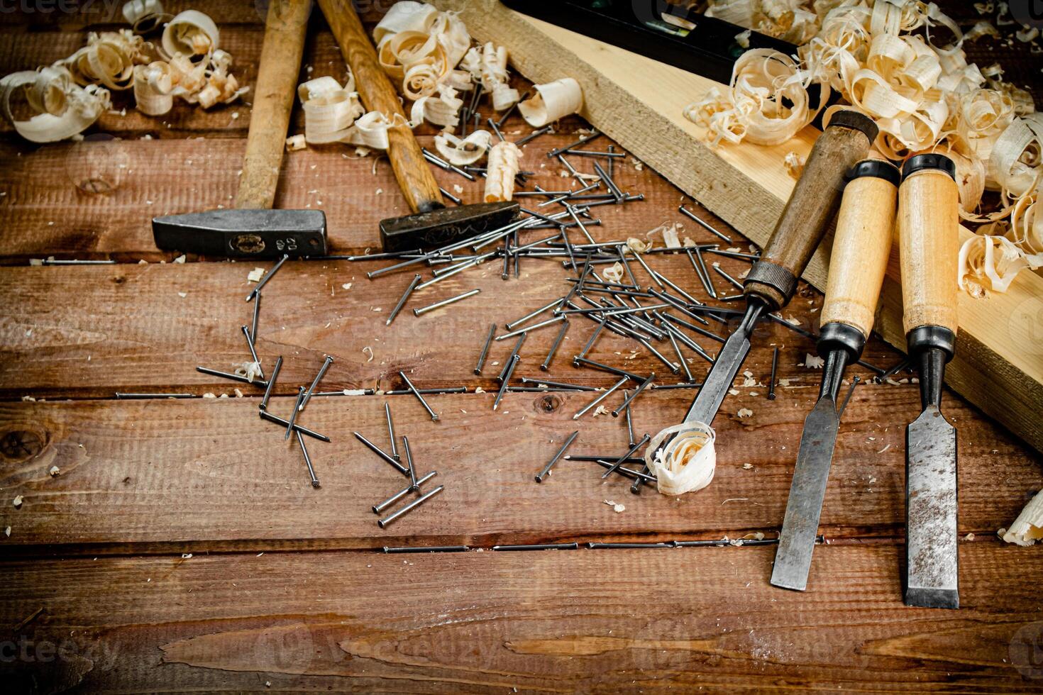 Working tool. Chisel, hammer and nails. photo