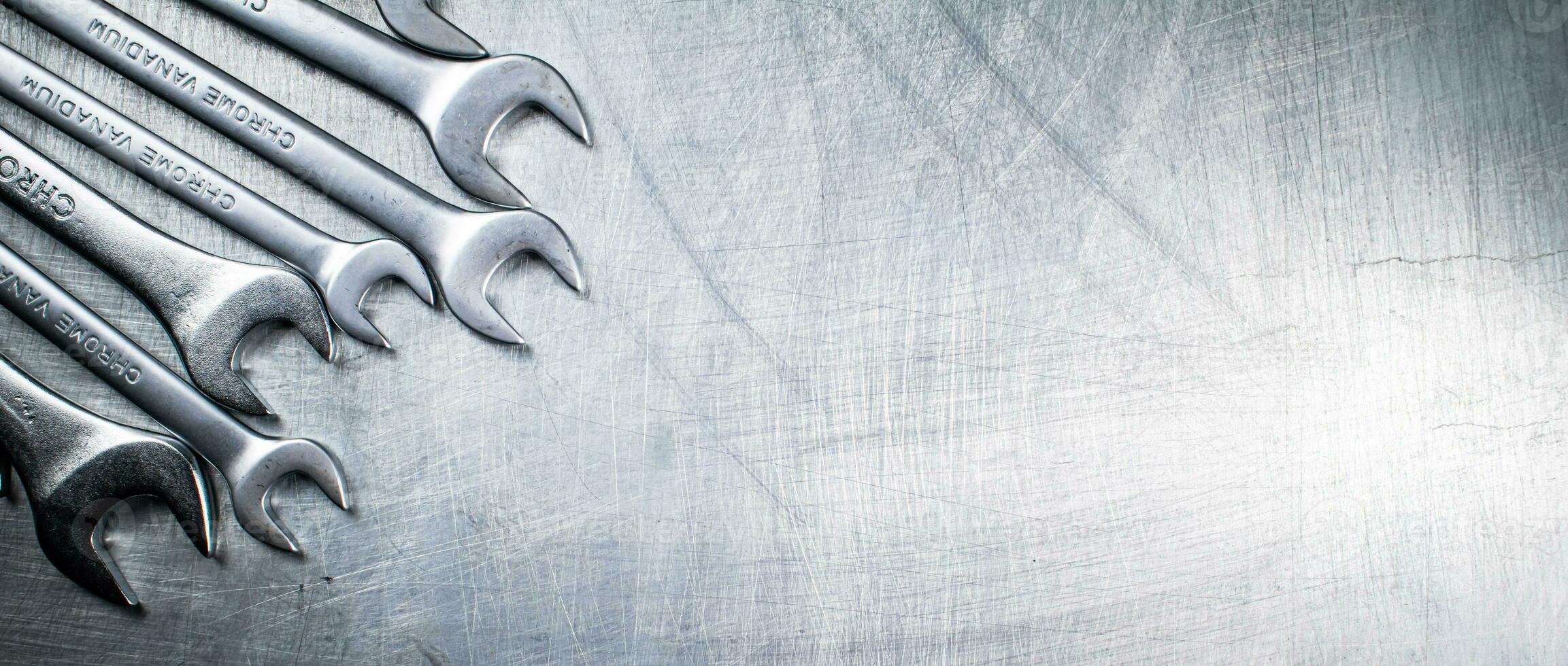 Wrench with nuts and bolts. photo