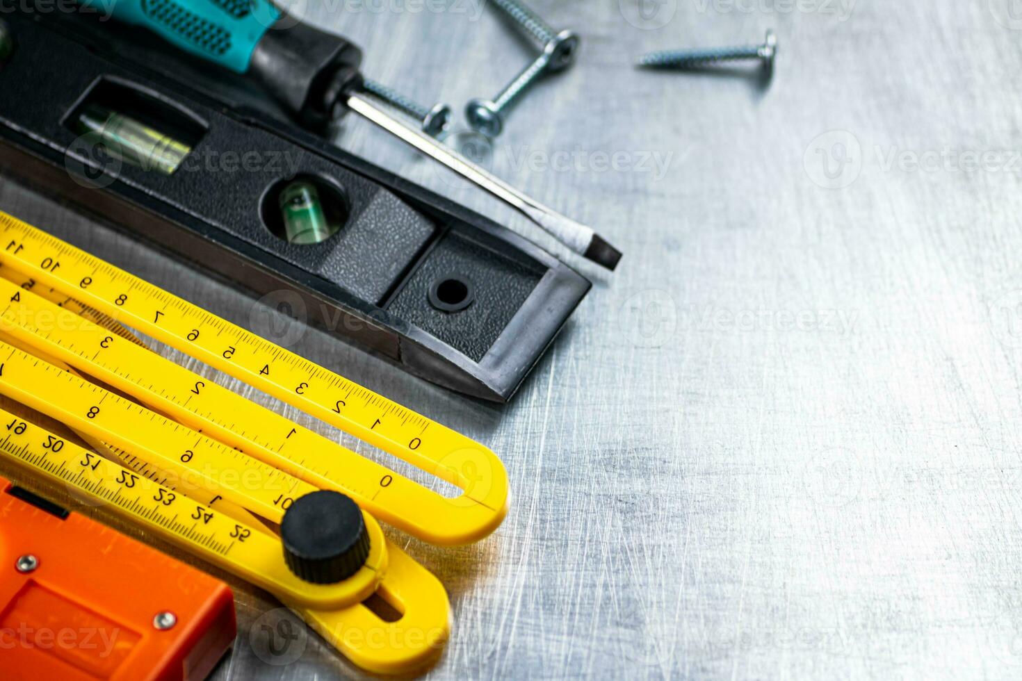 Construction stapler on the table. photo