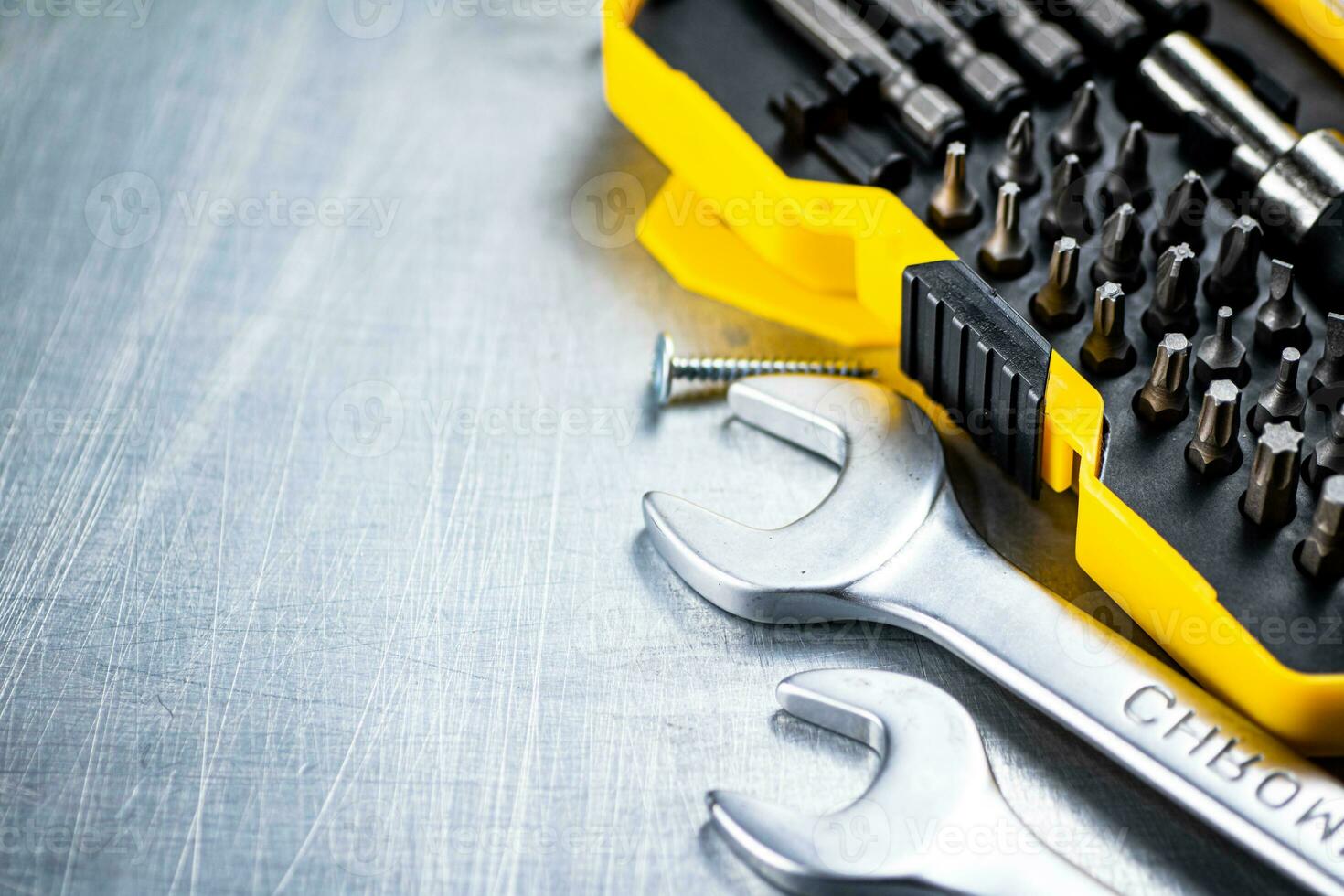 A set of bits with wrenches. photo