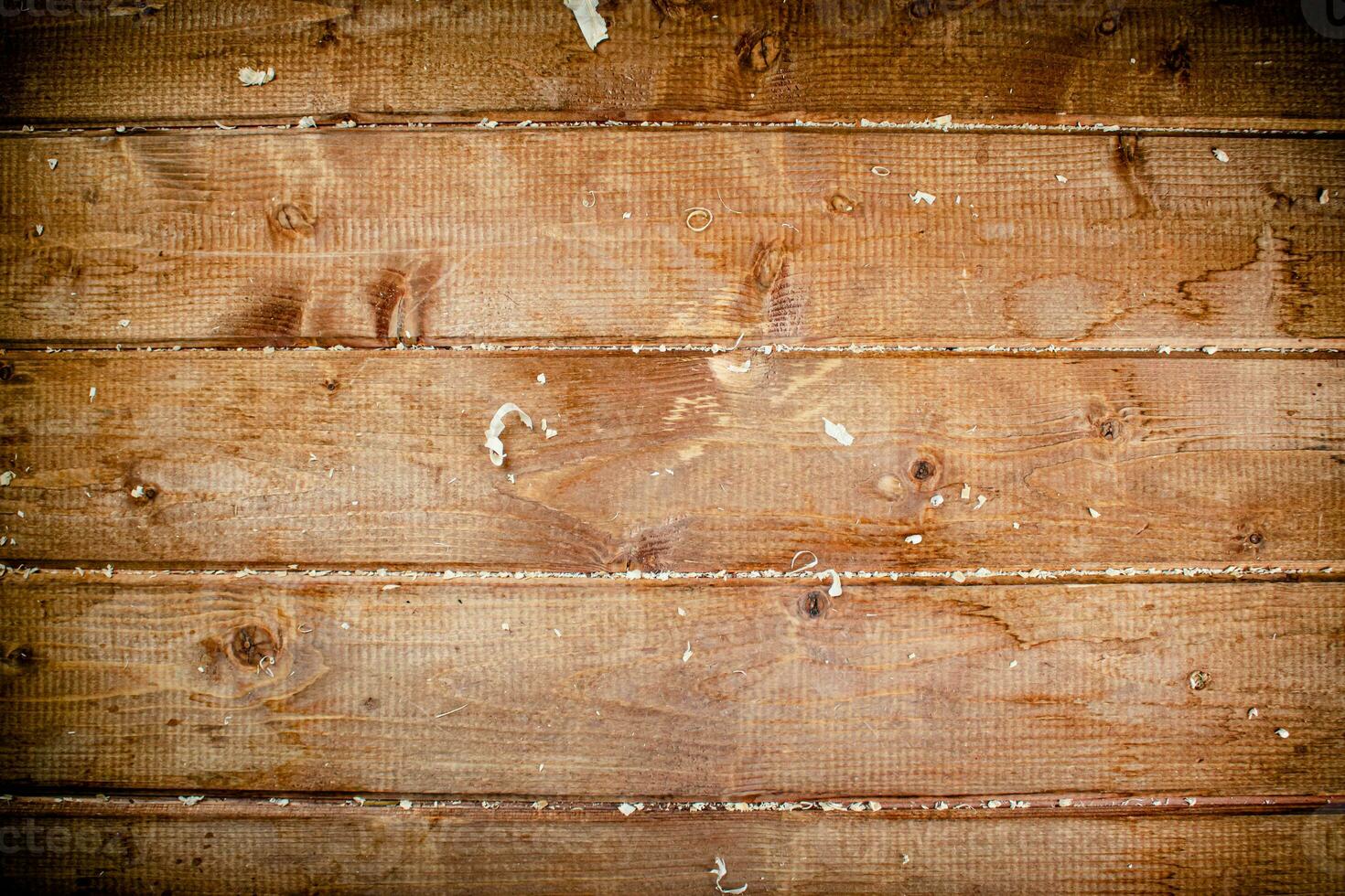 Wooden table with sawdust. Macro background. photo
