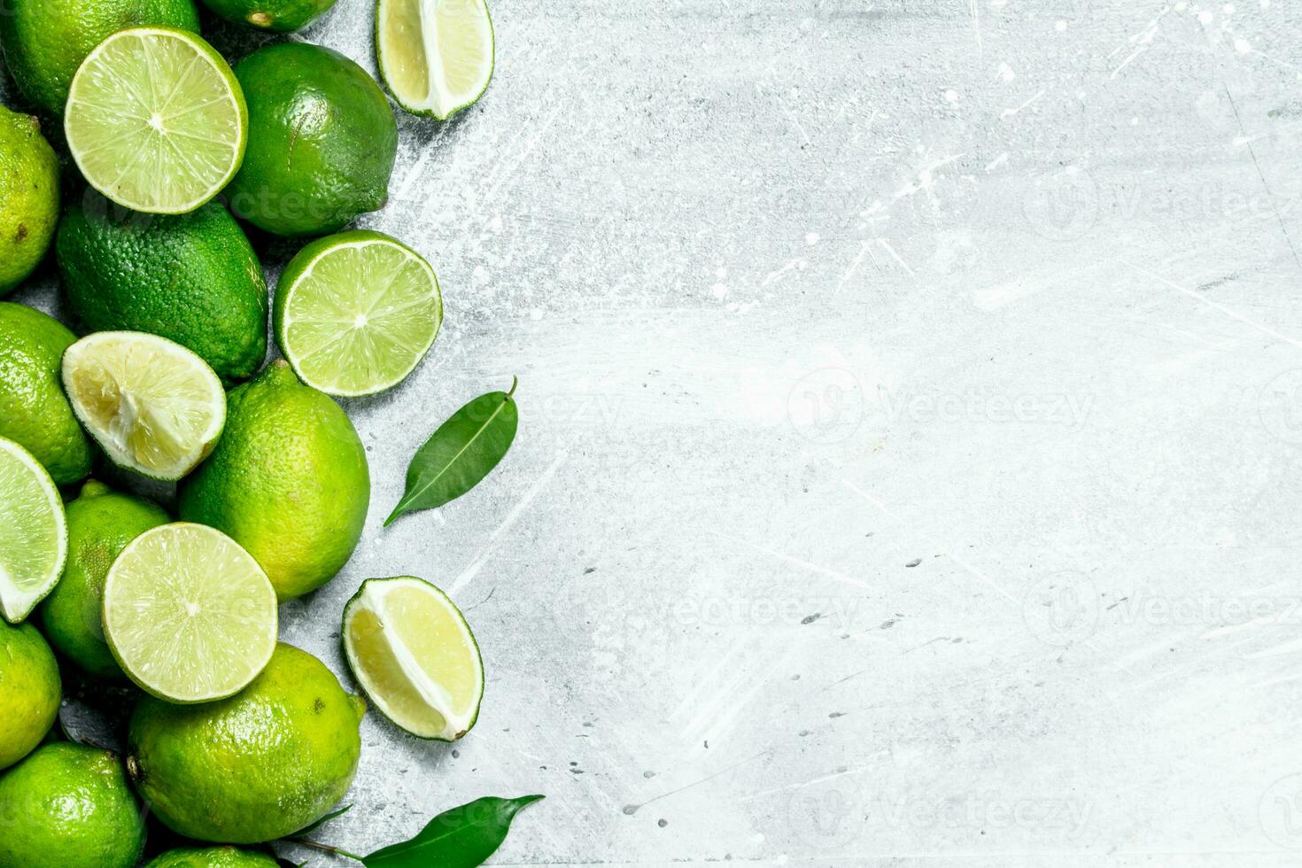 Fresh juicy lime with leaves. photo