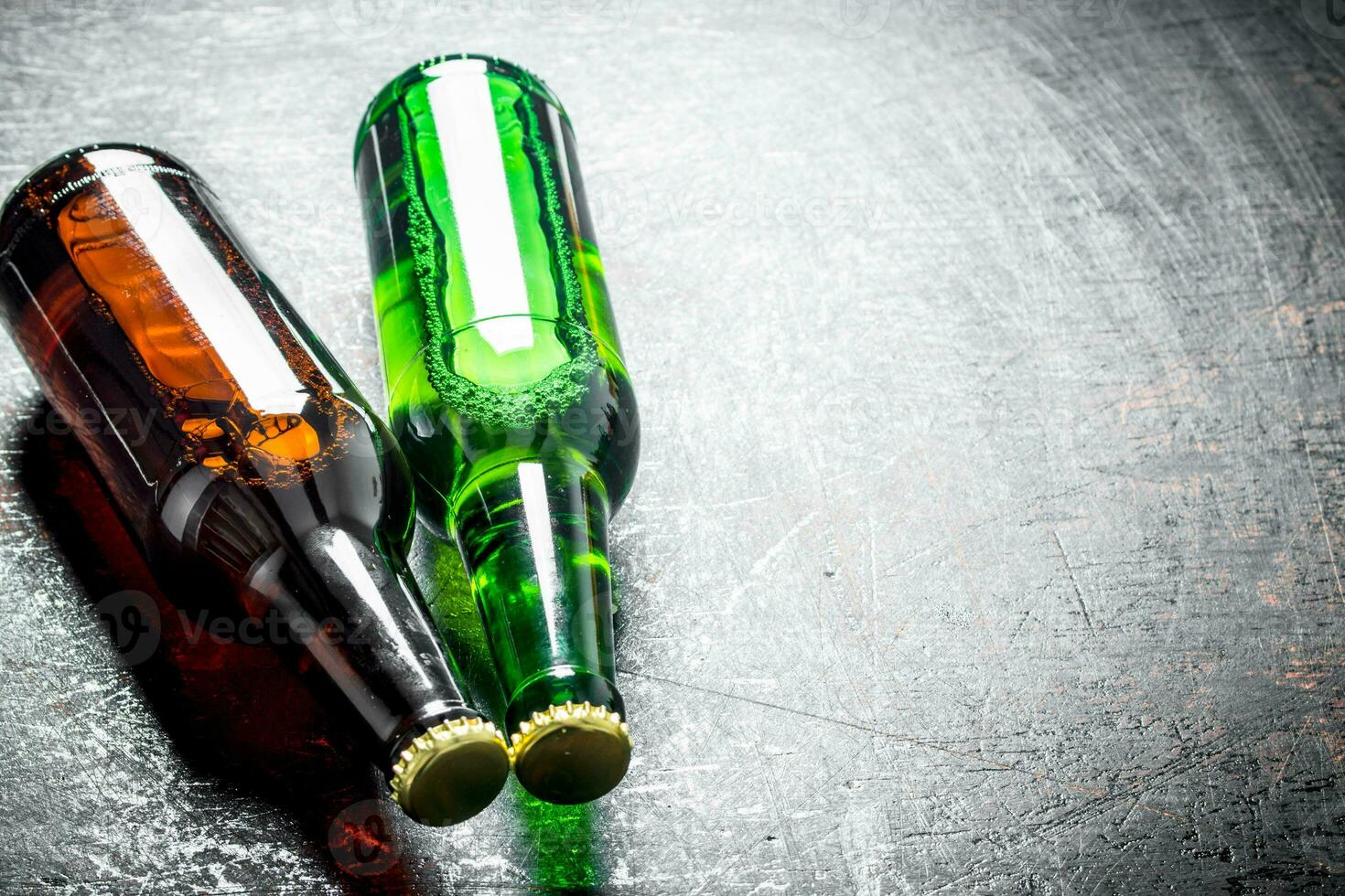 Two glass bottles of beer. photo