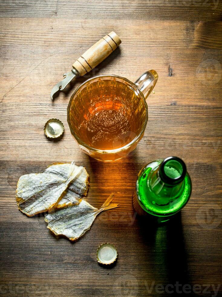 Beer and dried fish. photo