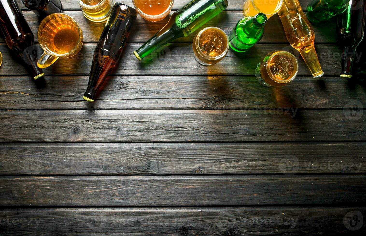 Beer in bottles and glasses. photo