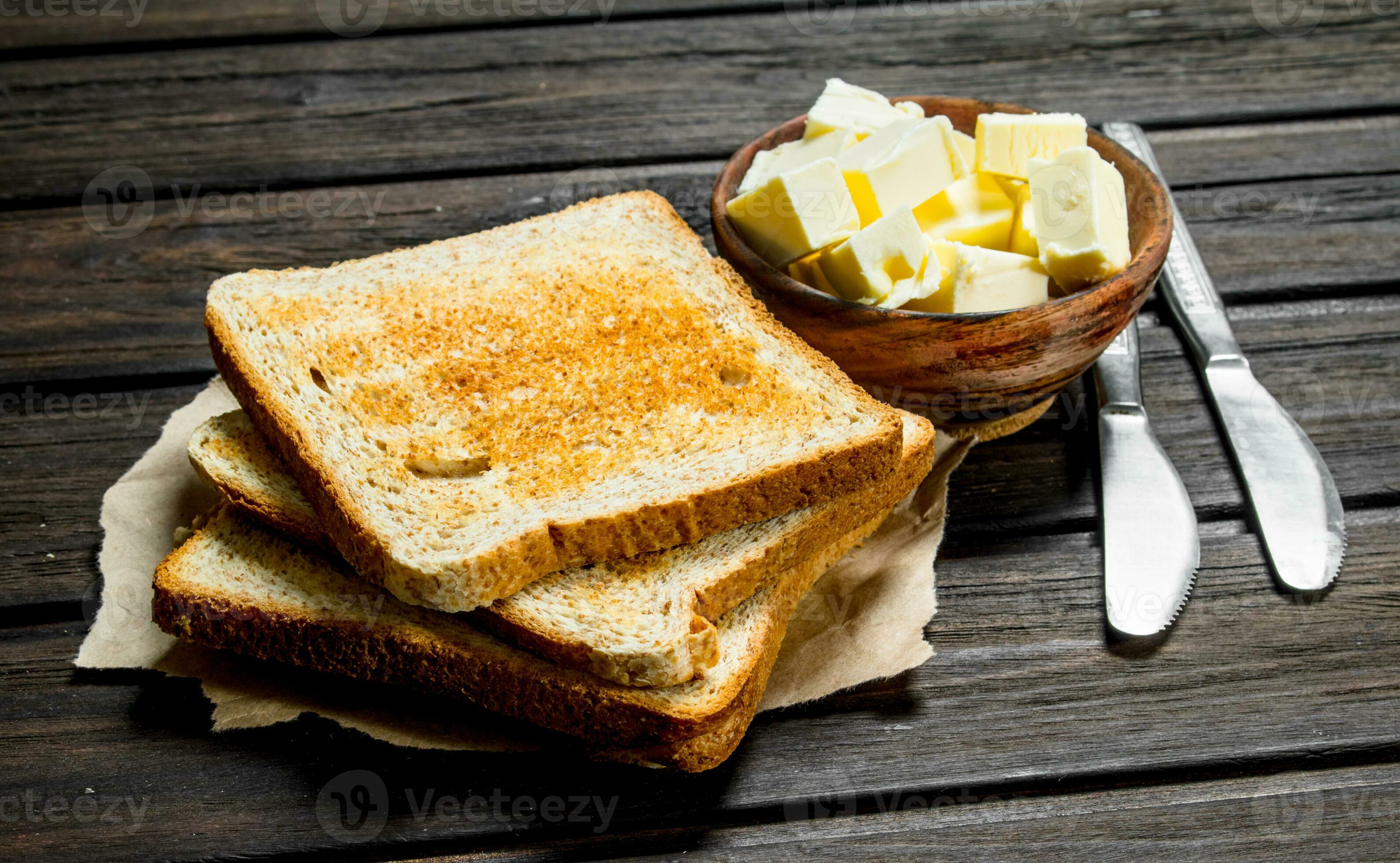 Toasted bread and butter. 32002040 Stock Photo at Vecteezy