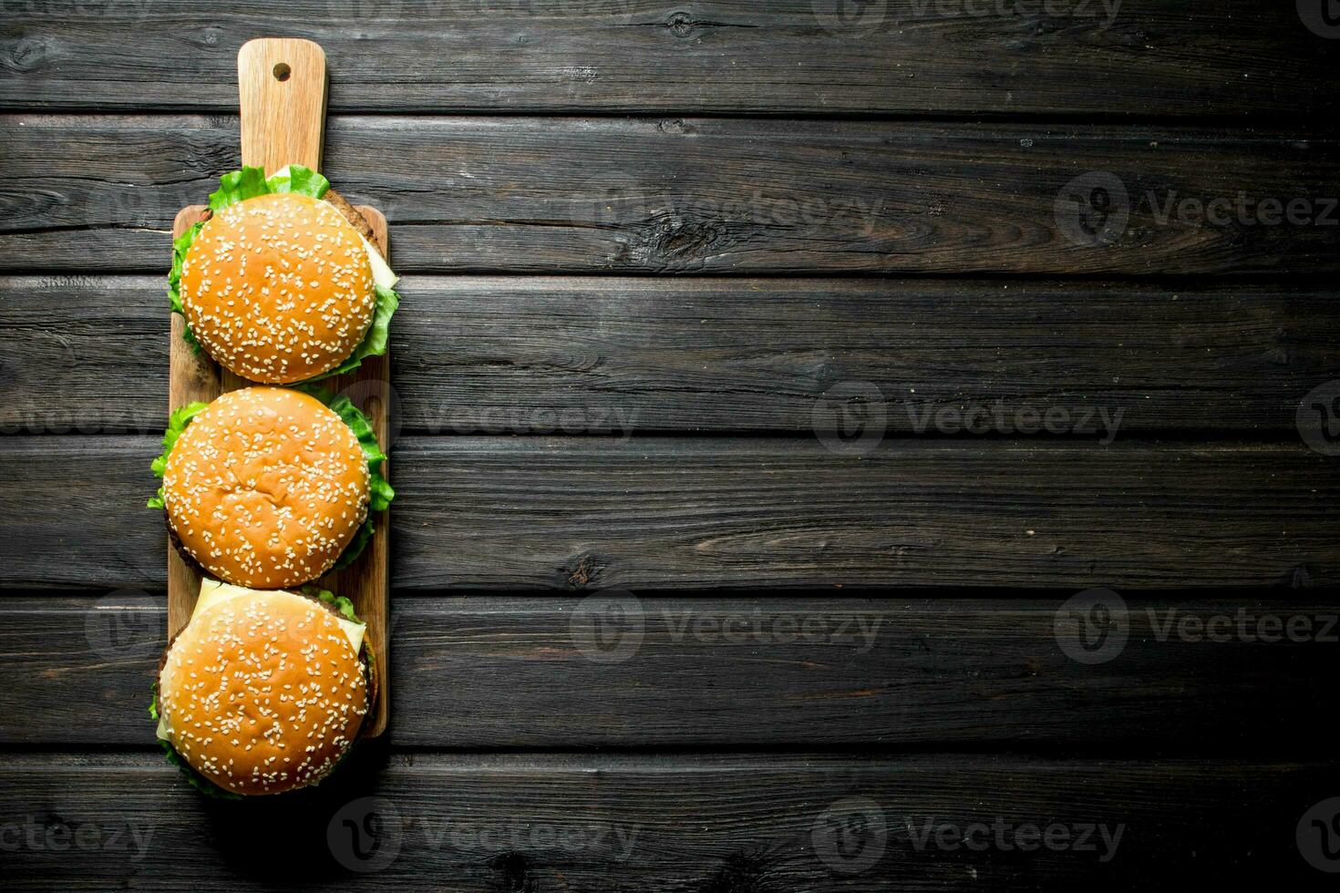 Beef burgers on the stand. photo