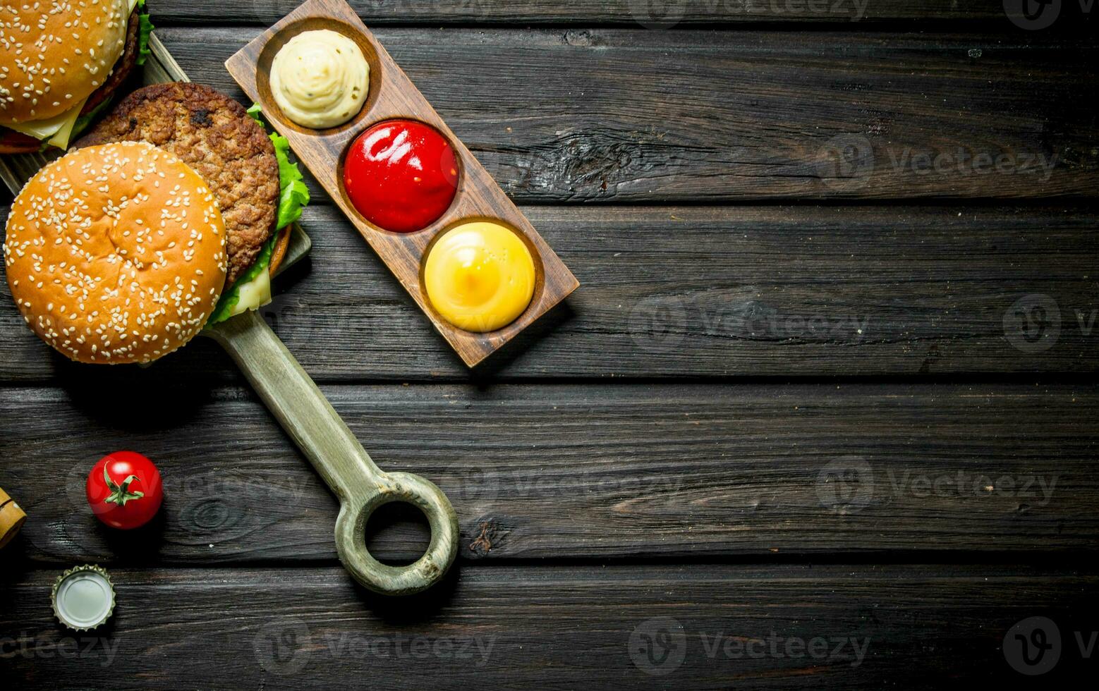 Burgers with beef and sauces. photo