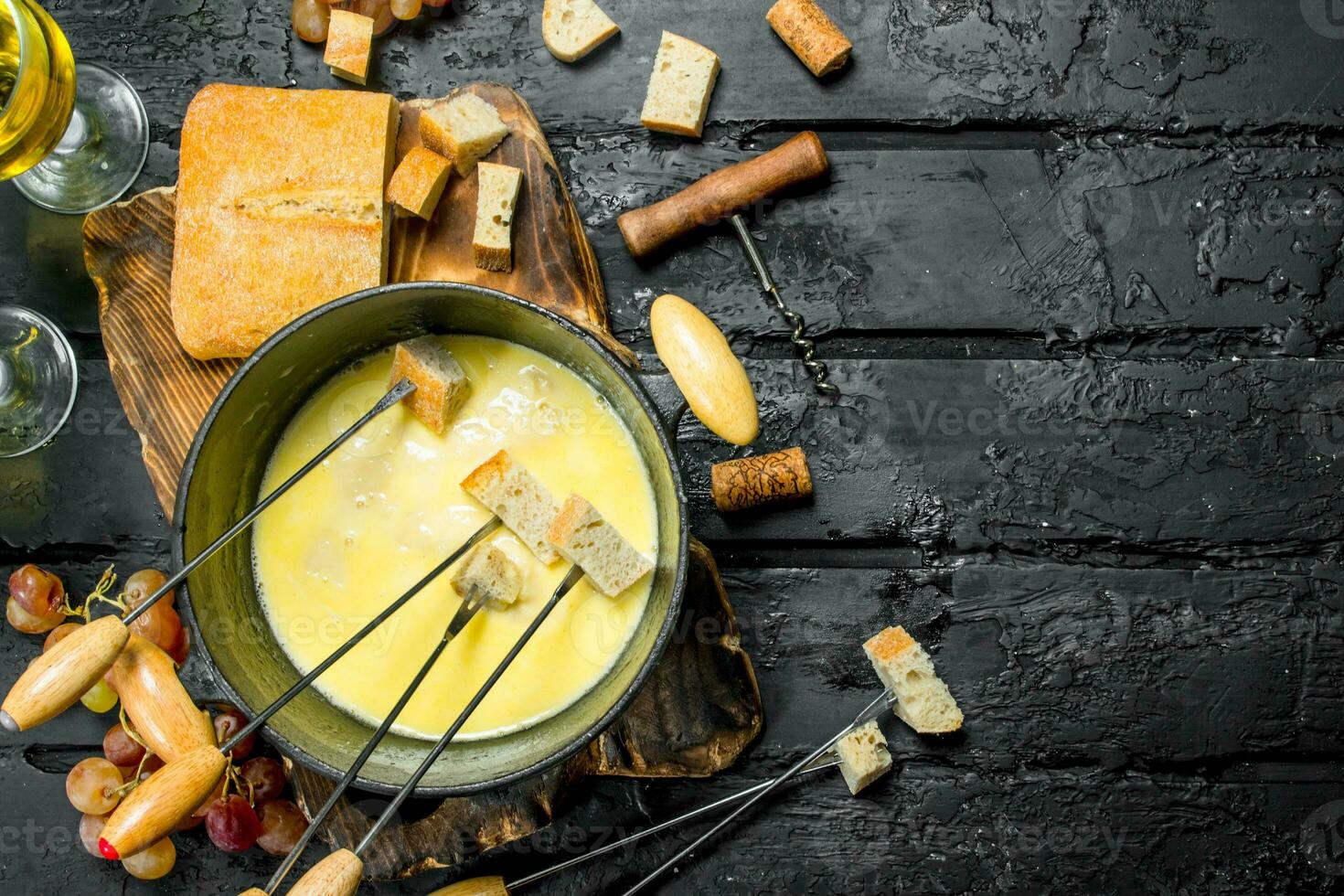 Delicious fondue cheese with white wine. photo