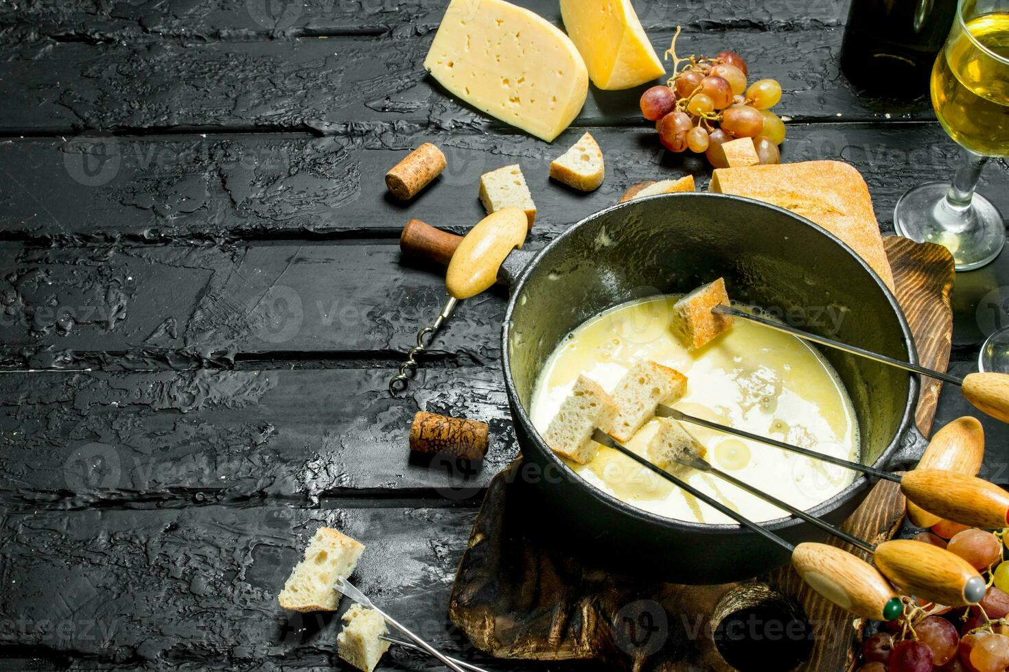 Delicious fondue cheese with white wine. photo