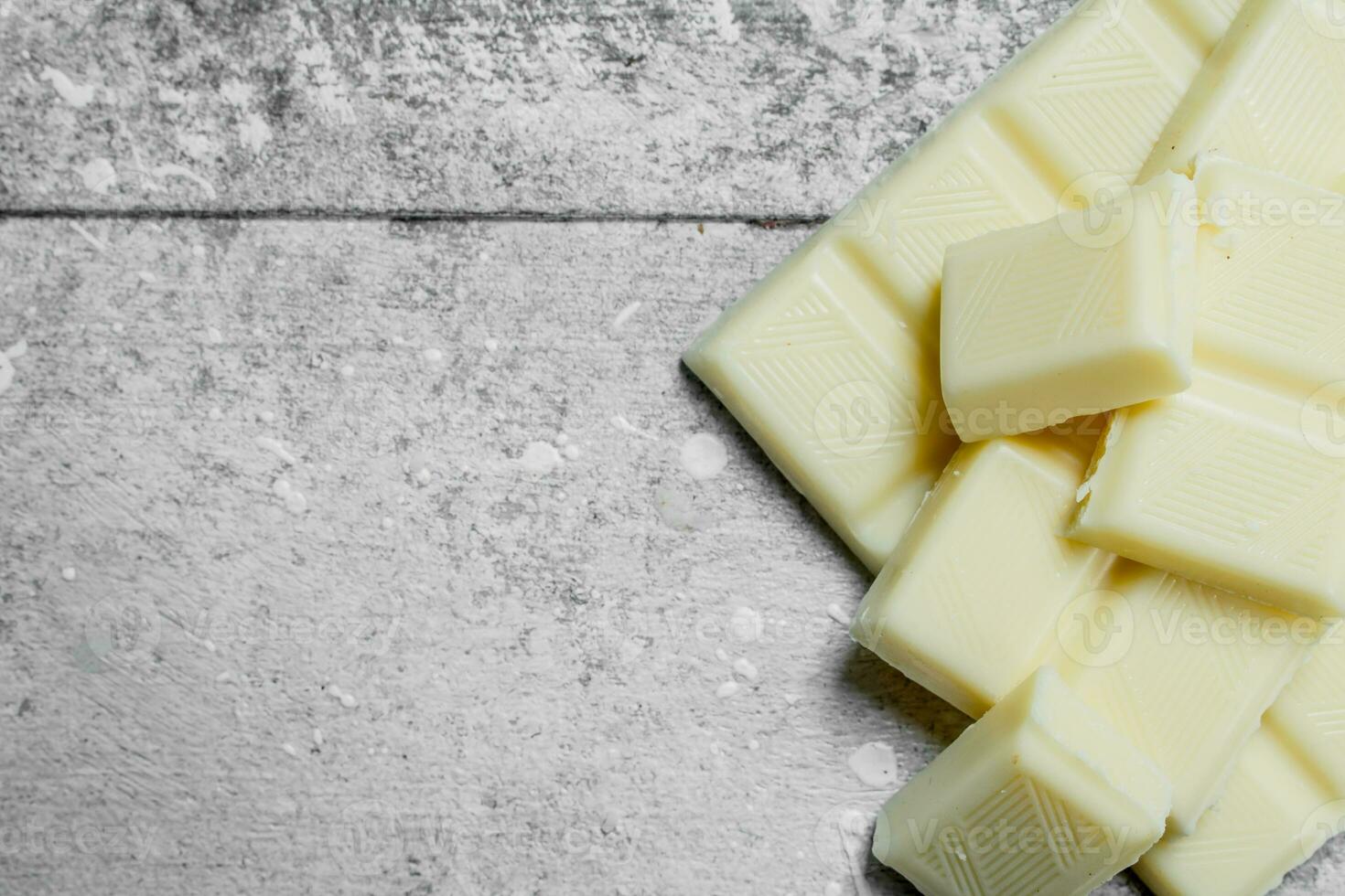 Pieces of white chocolate. photo