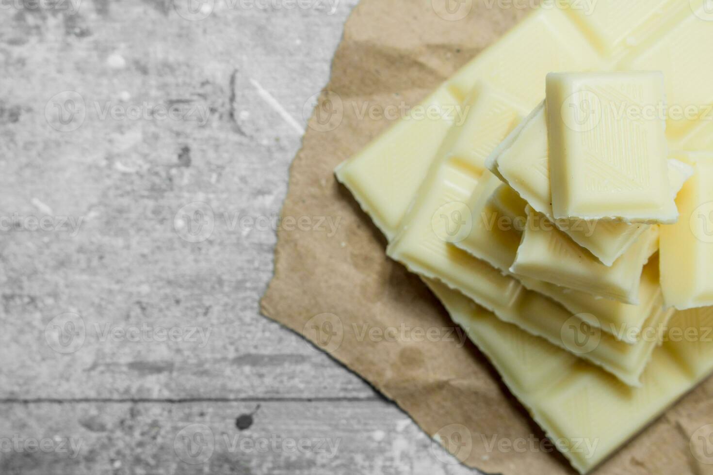 White chocolate on paper. photo