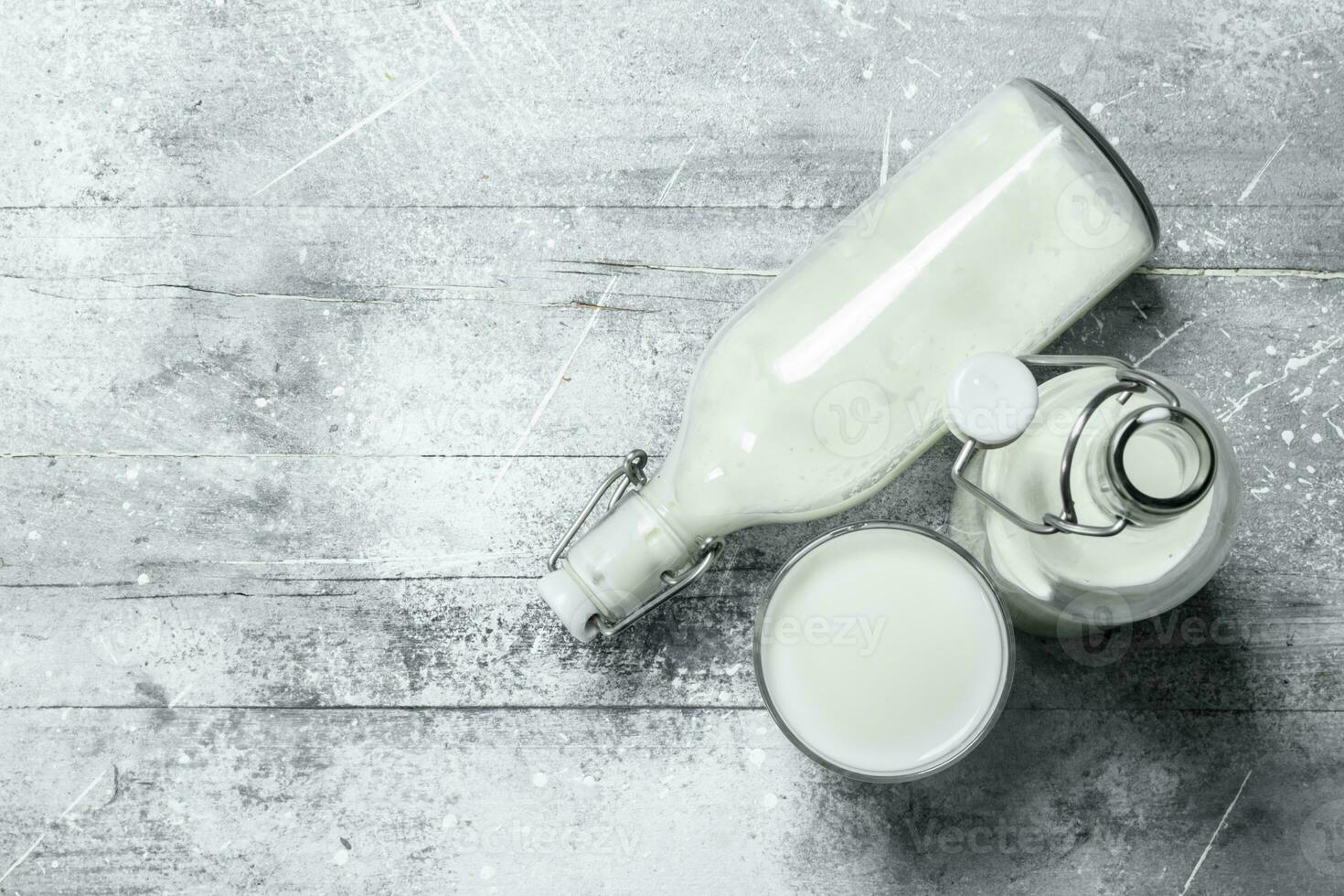Milk in glass bottles. photo