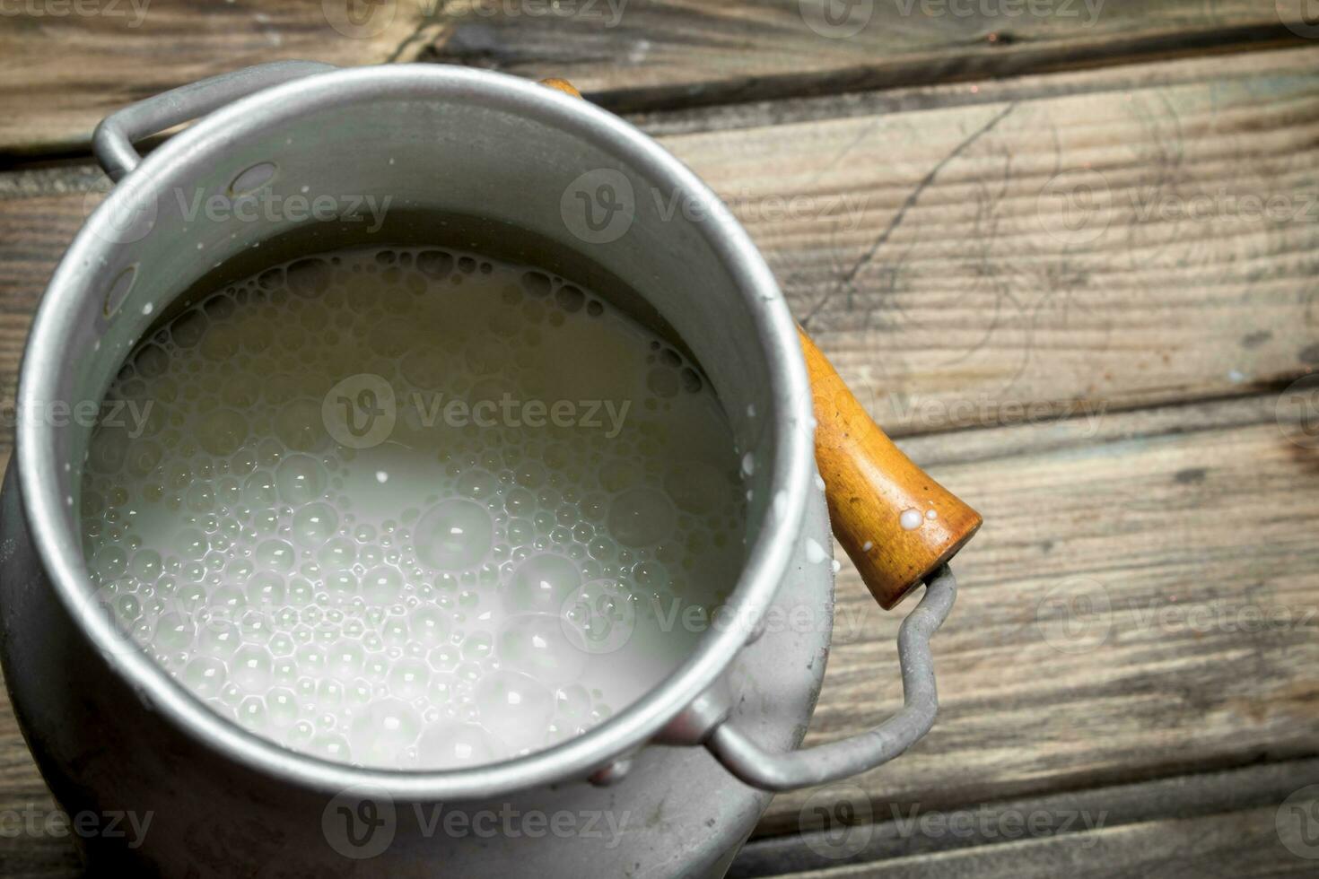 Fresh milk in a can. photo