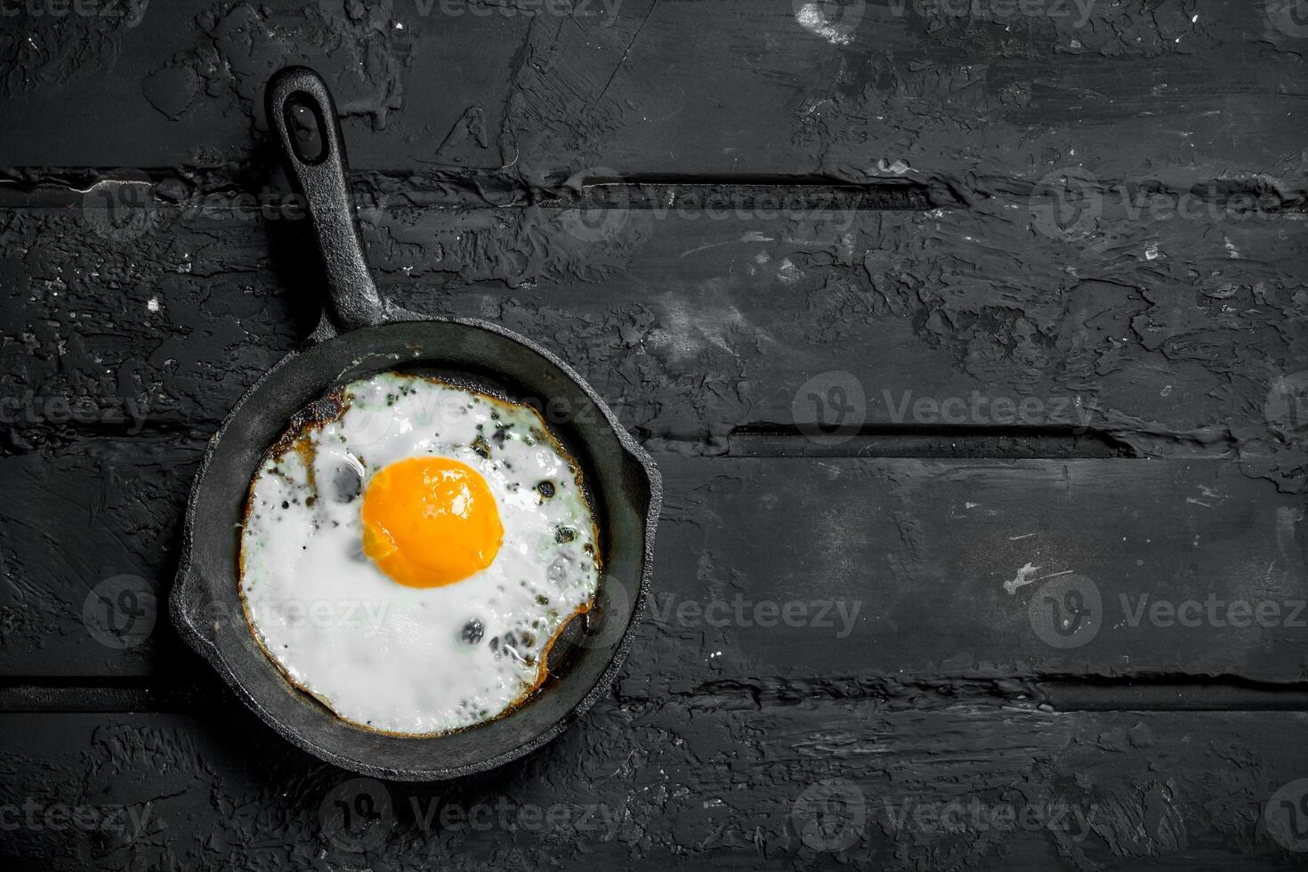 Fried egg in a frying pan. photo